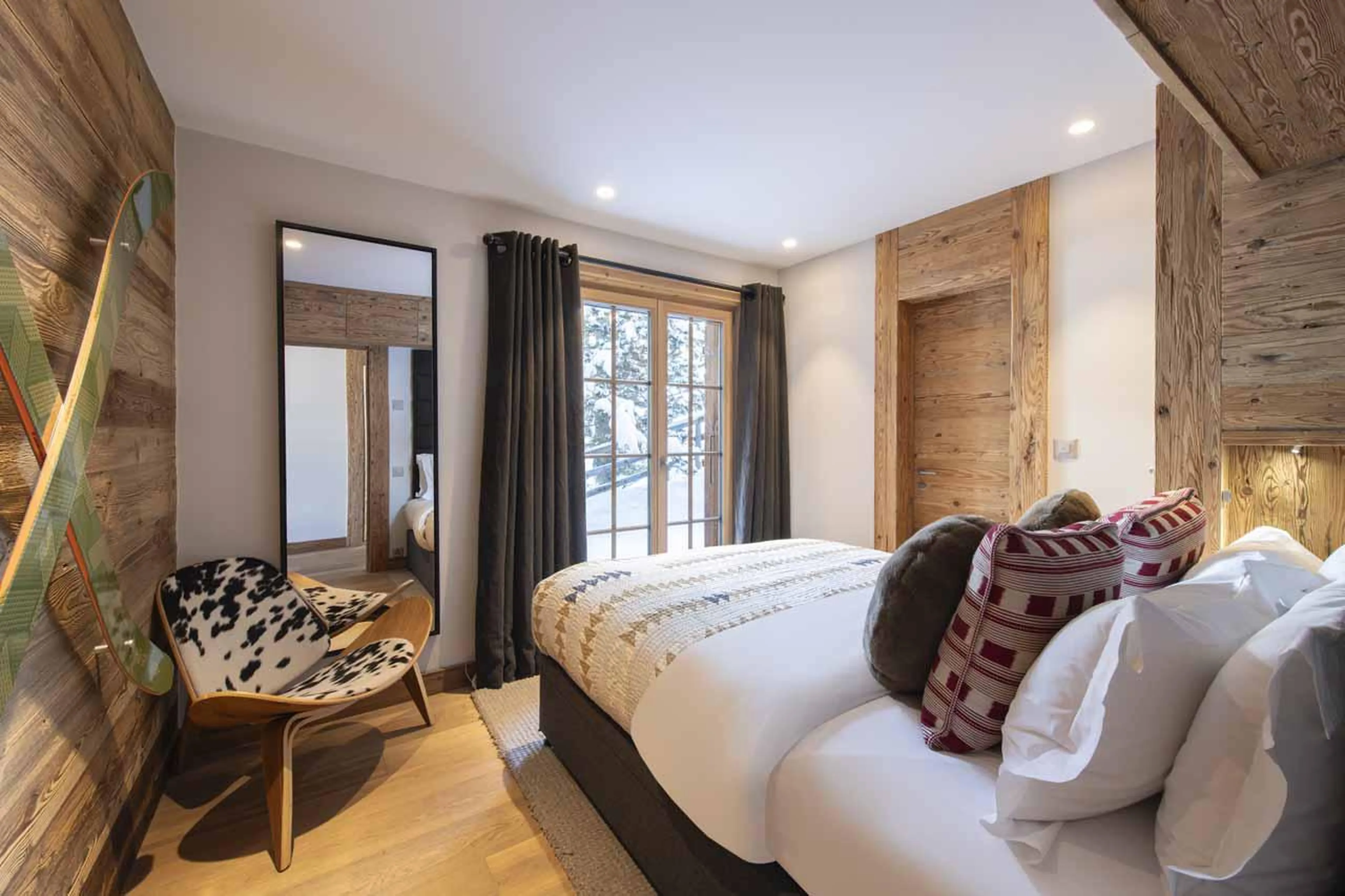 Access to terrace from bedroom three in Chalet Daphne in Verbier