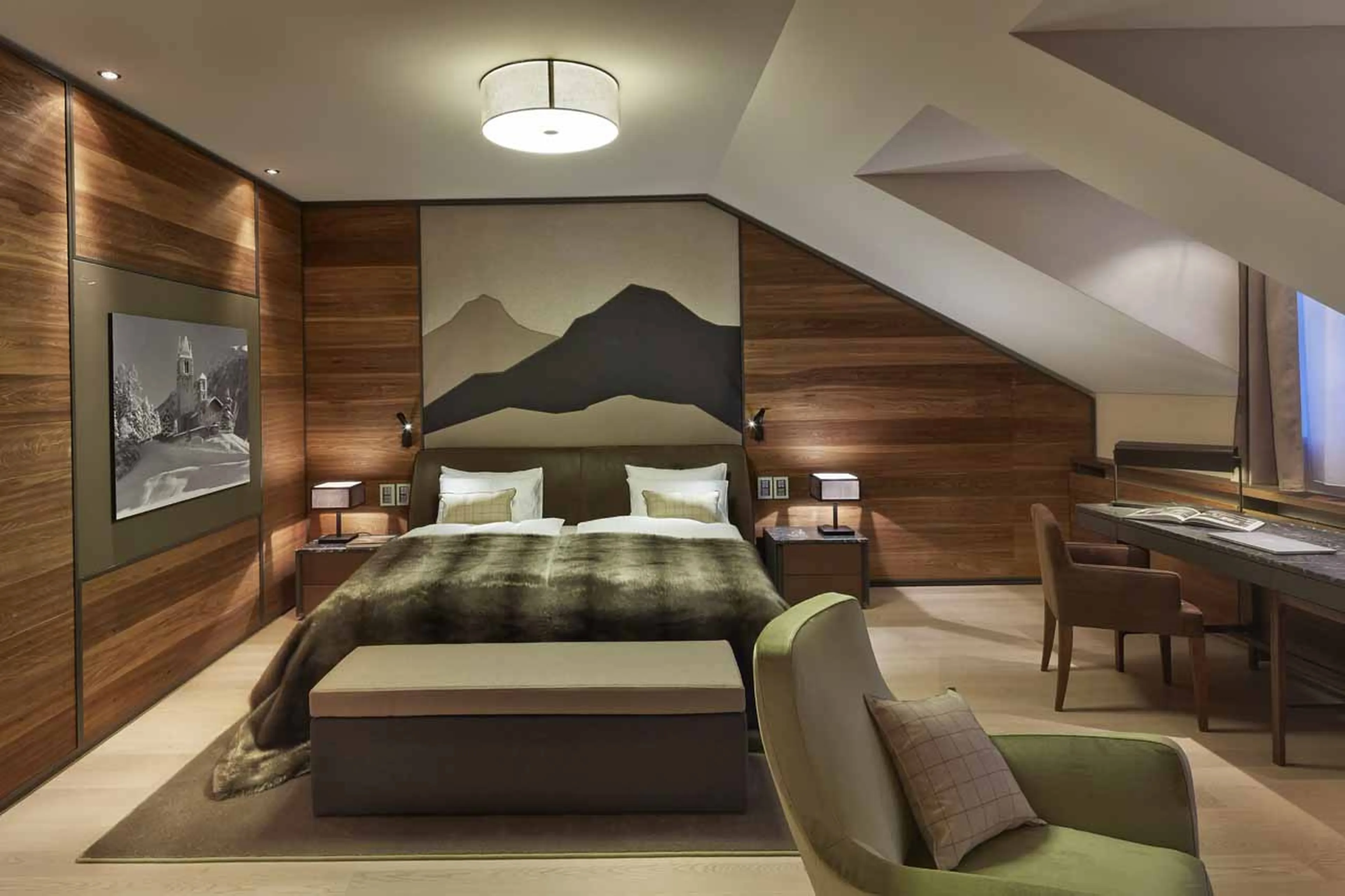 Bedroom one with desk at Corvatsch Tower in St Moritz