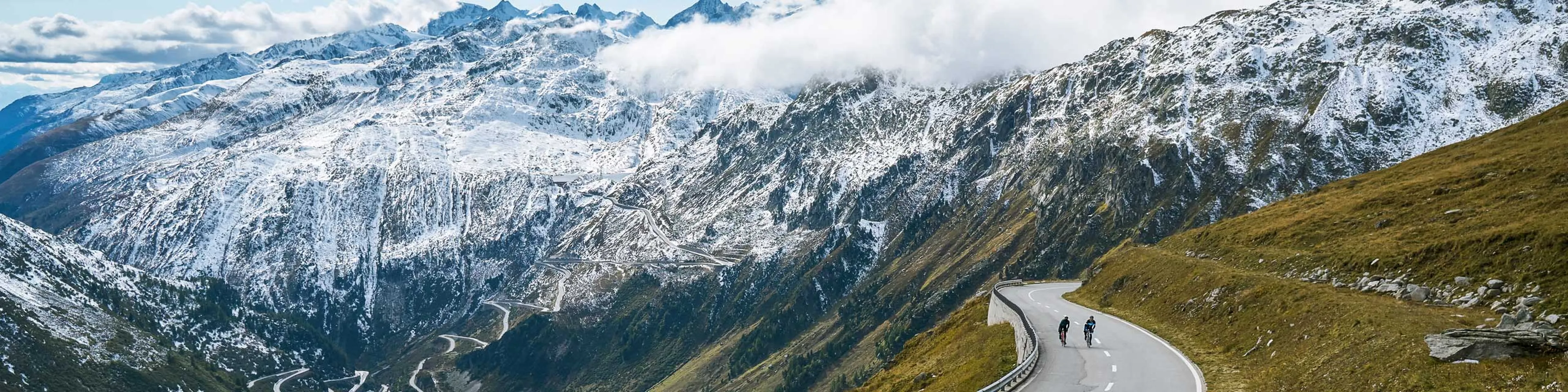 Cycling on Furka Pass in summer