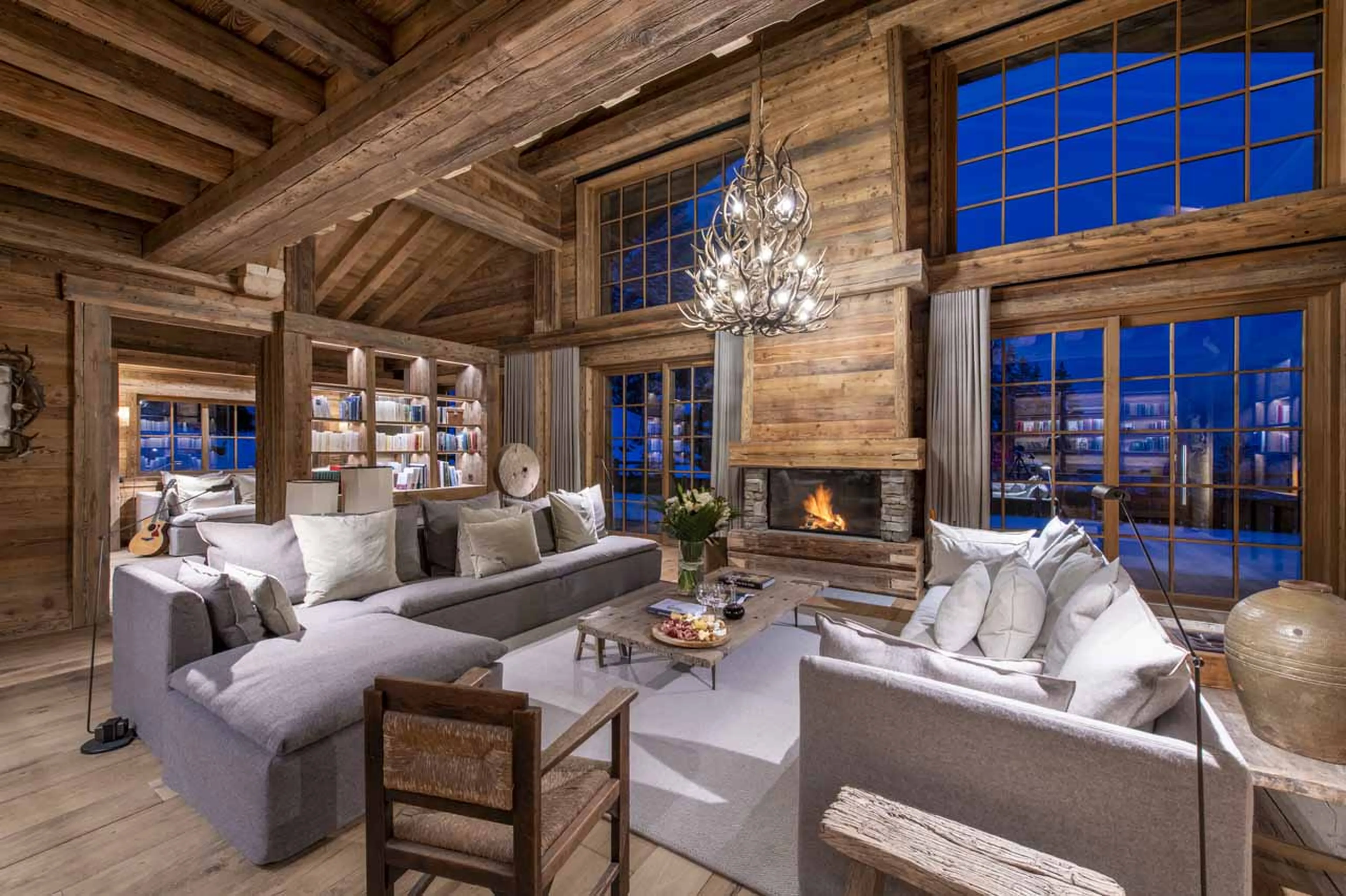 Fireplace at night at Chalet Domaine de l'Orme in Meribel