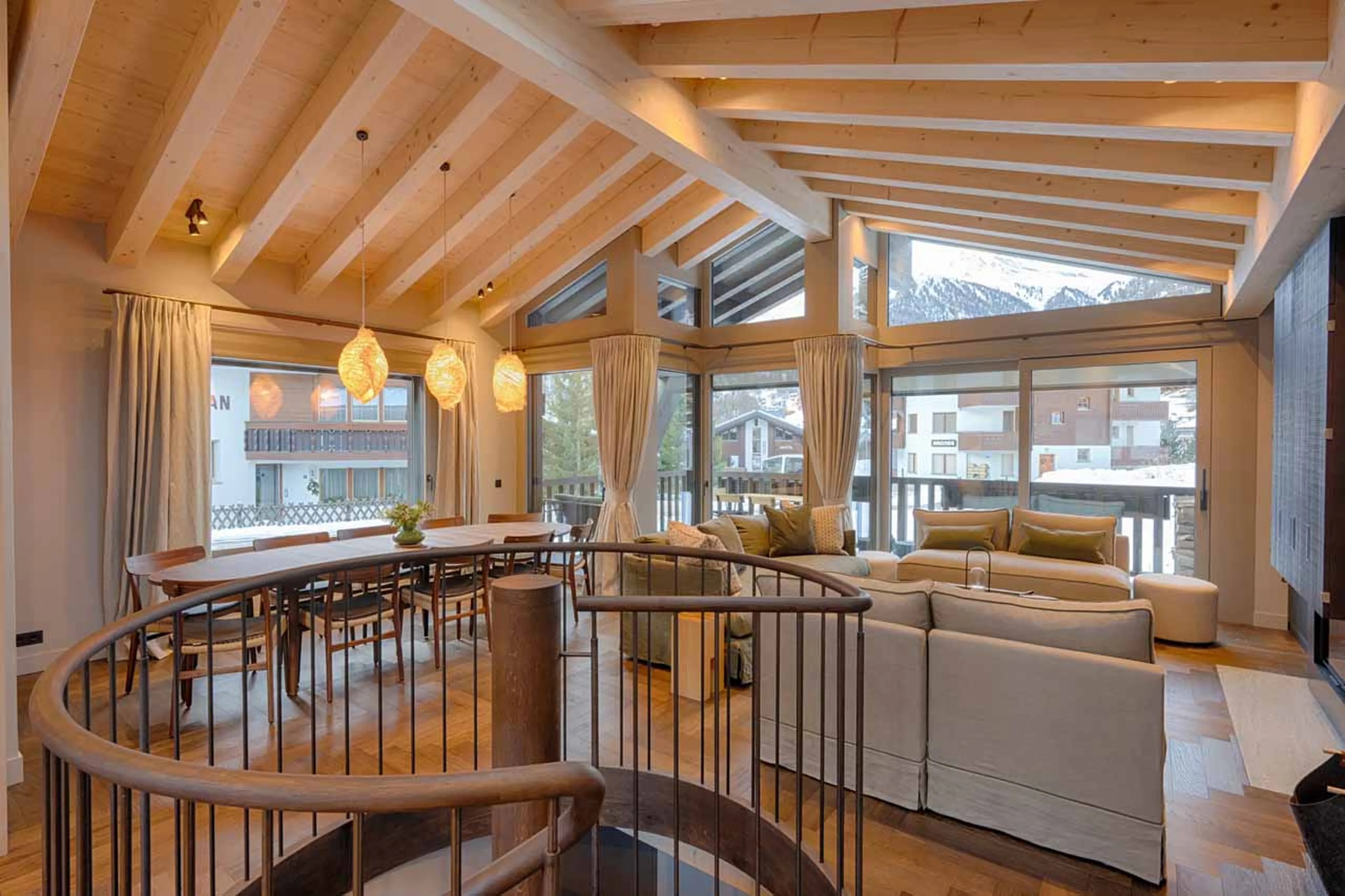 Open-plan living area at Dufourspitz Lodge in Zermatt