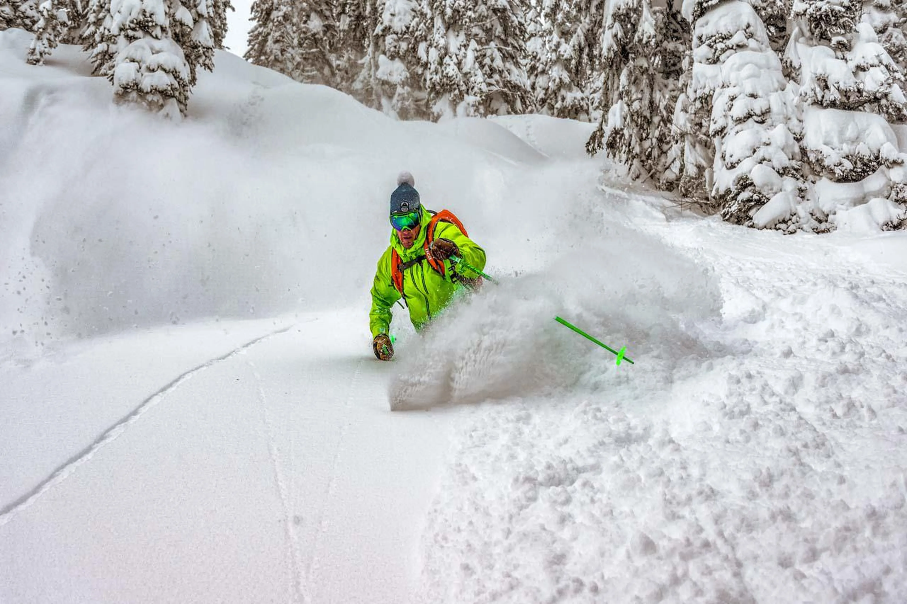 Skiing fresh powder at Eleven Revelstoke Lodge
