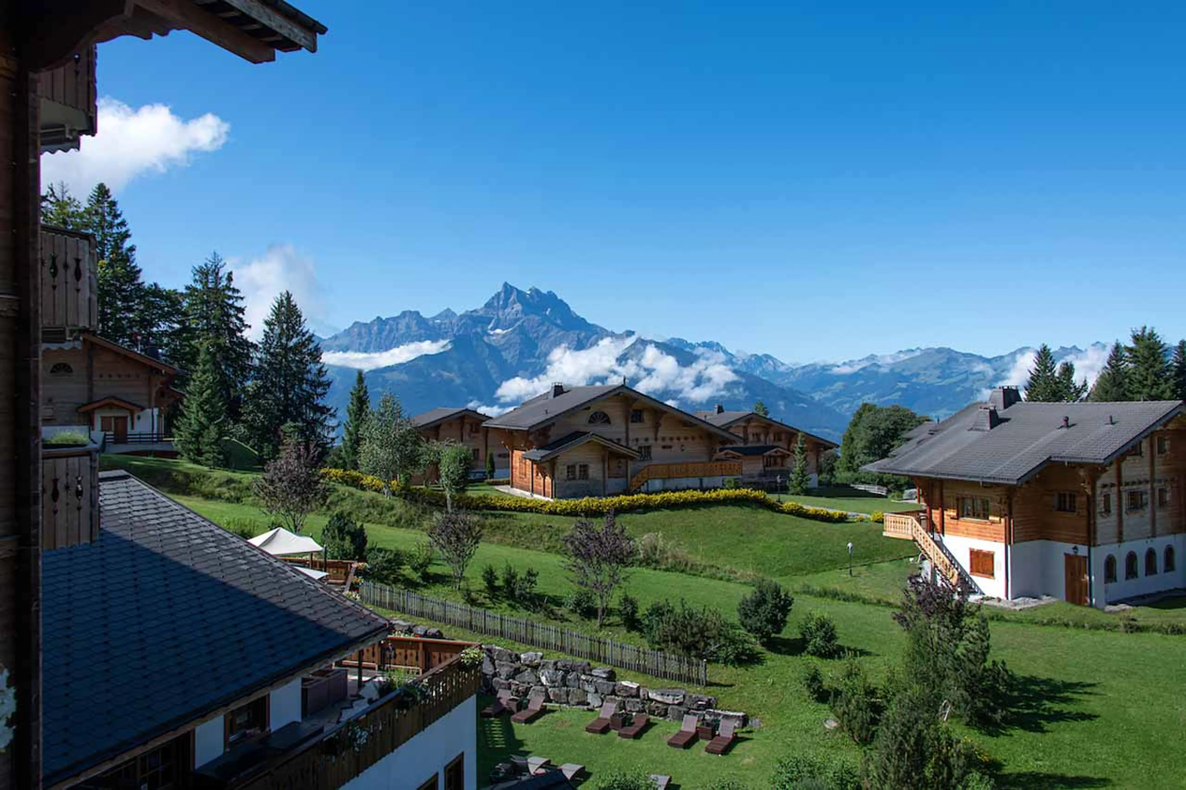 Exterior of Chalet Royalp Hotel & Spa in Villars in summer