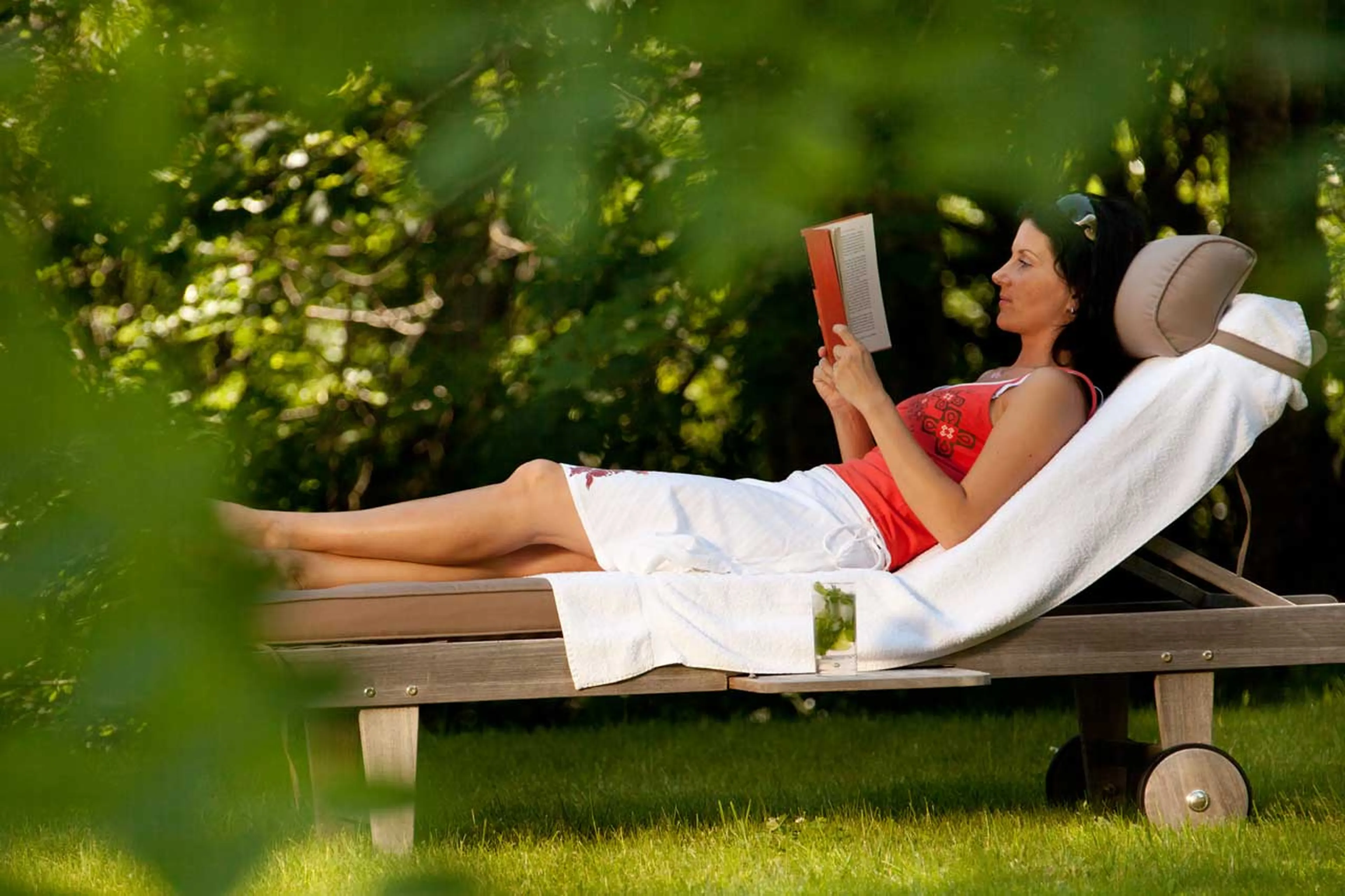 Relaxation in garden of Ferme de Moudon in Les Gets