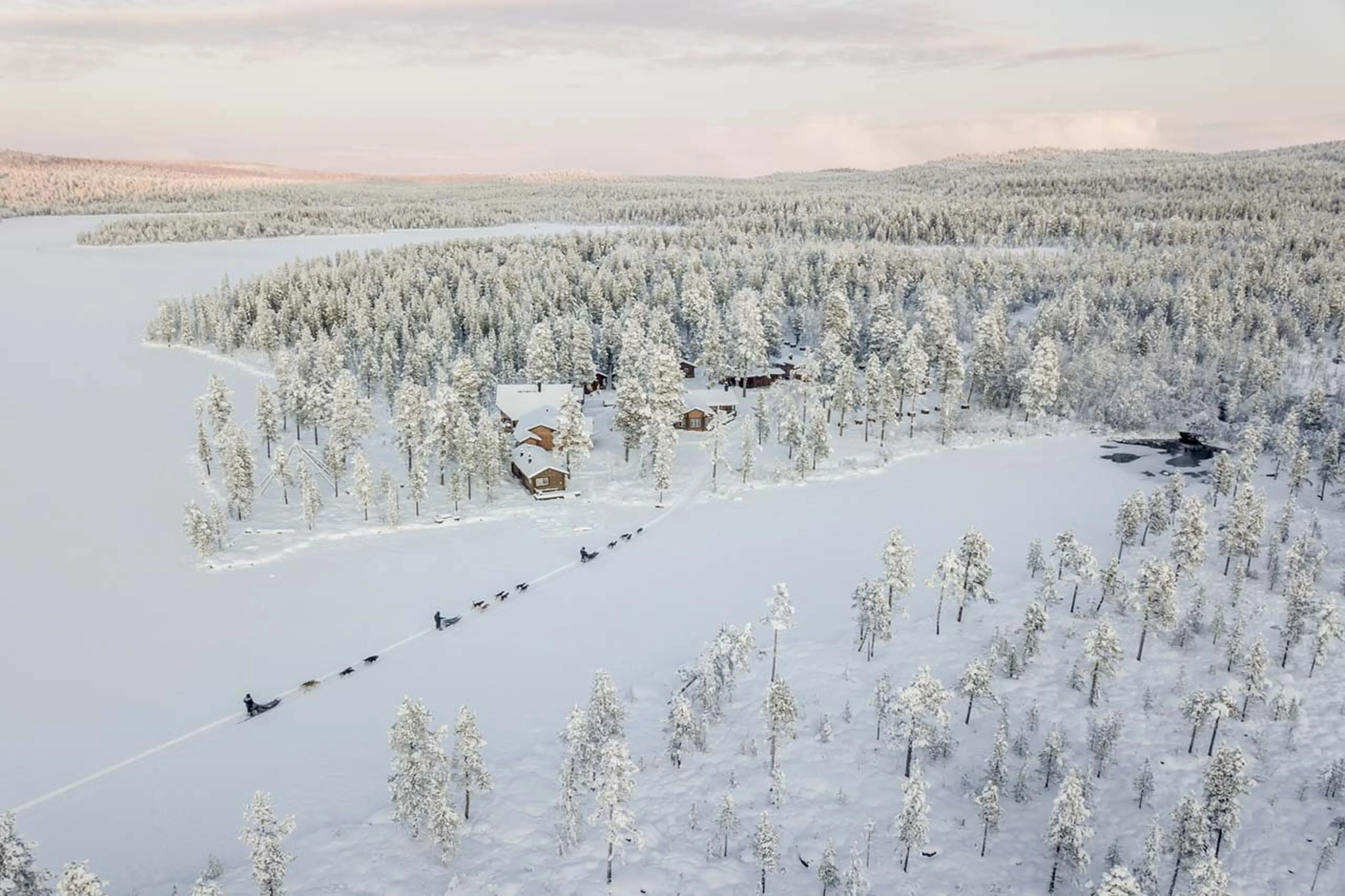 Aerial view of dog sledding from Fjellborg Arctic Lodge in Sweden