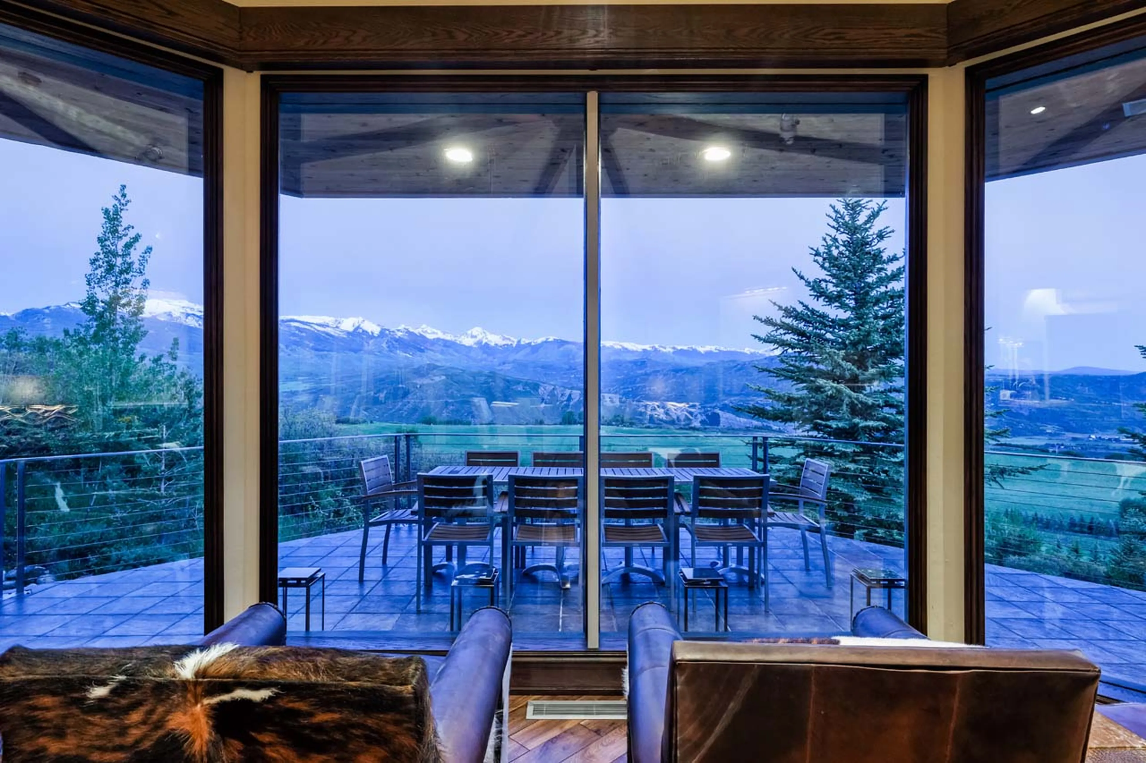 Outdoor dining area at Four Peaks Estate in Aspen
