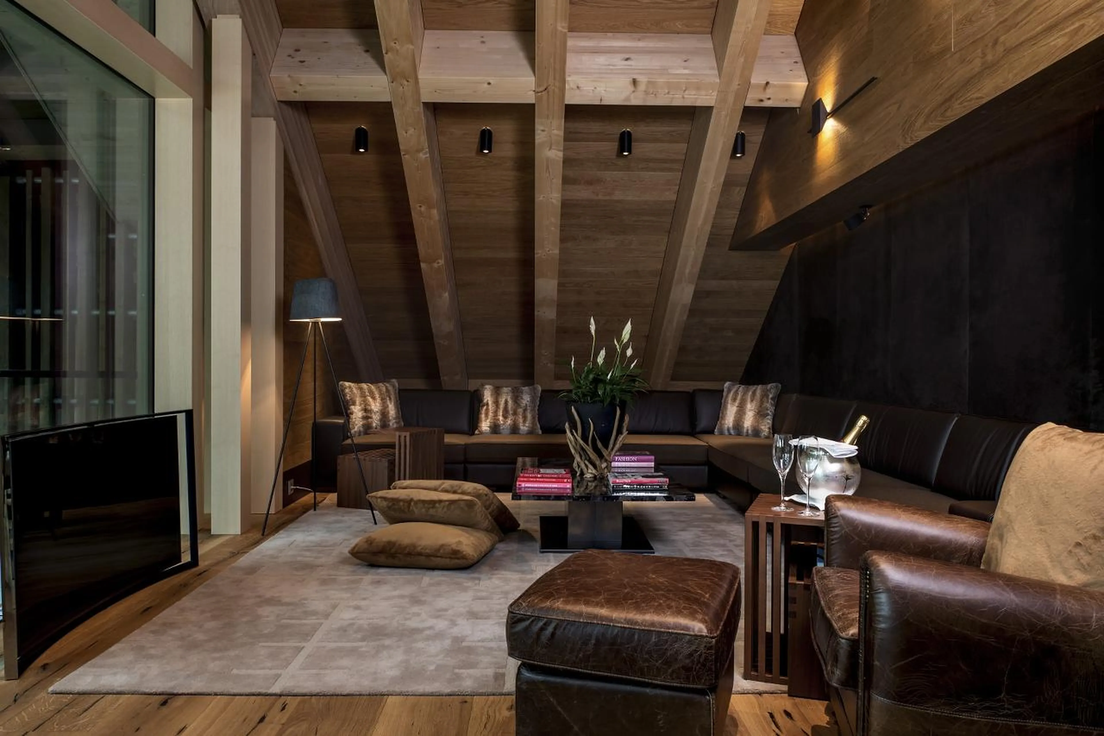 TV area in living room of Furka Suite in Andermatt