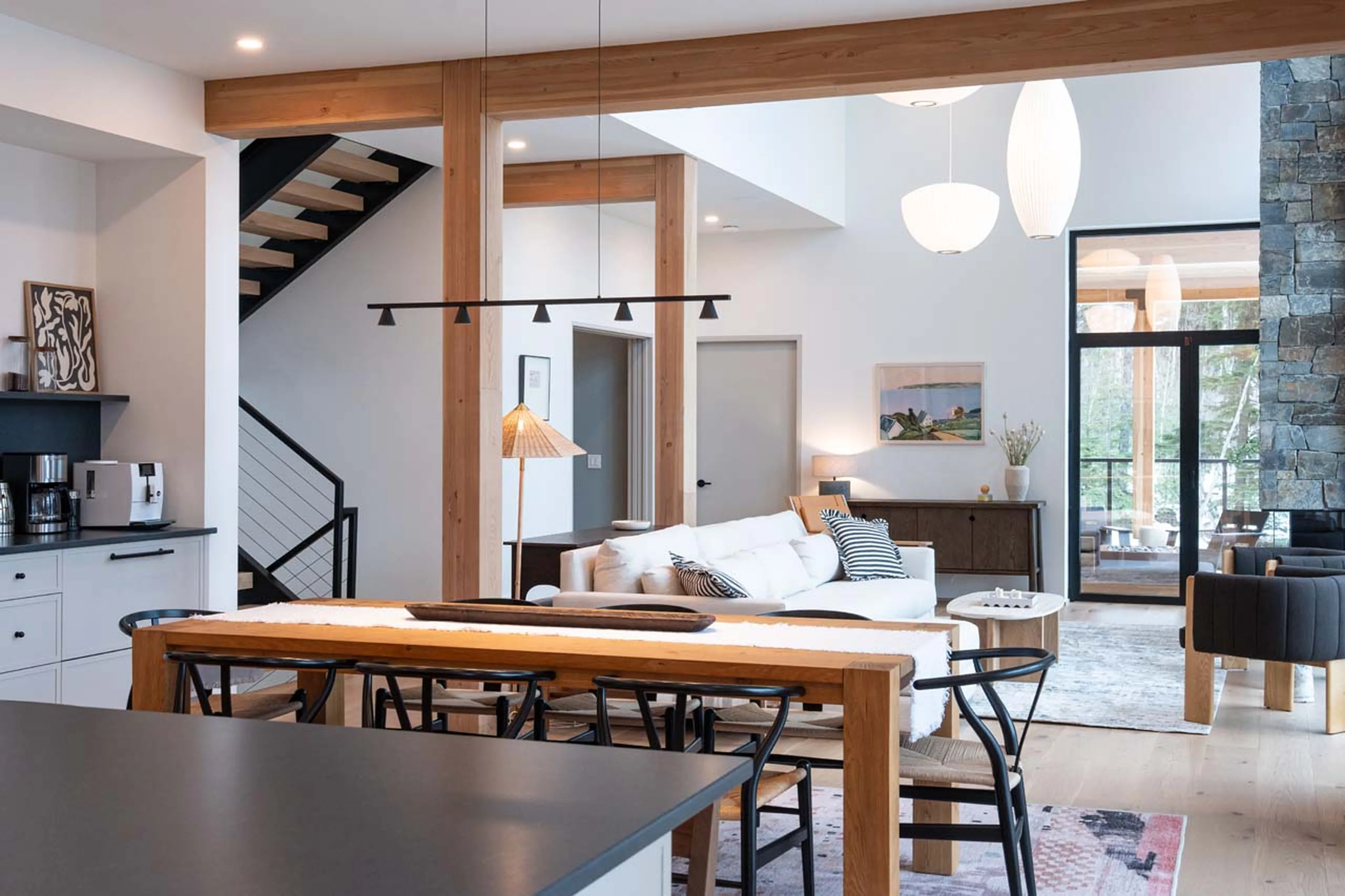 Kitchen island and dining table in Ghost Peak Chalet, Revelstoke