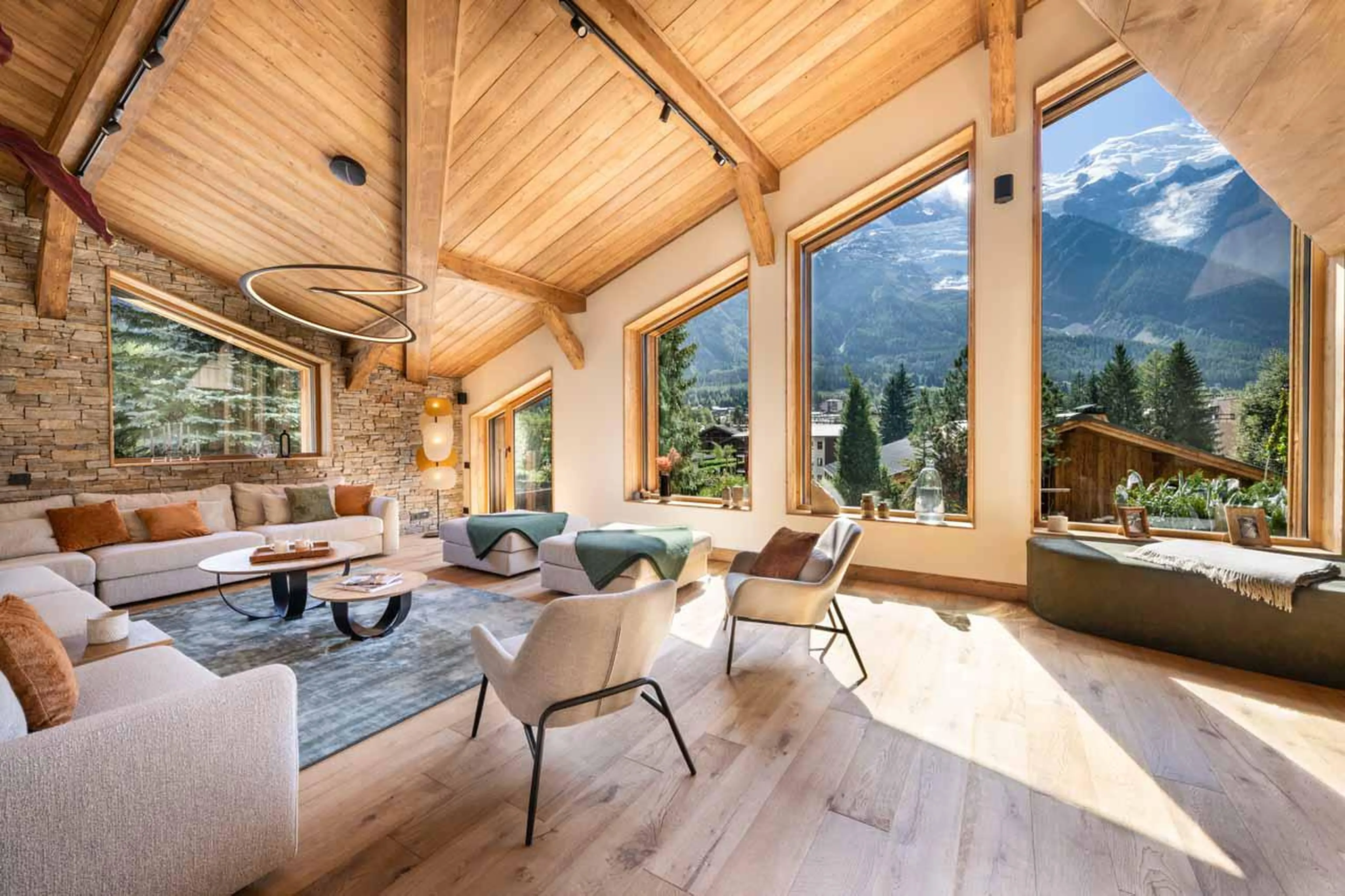 Sofa space overlooking beautiful panoramic mountain views at Granite Mountain Lodge in Chamonix