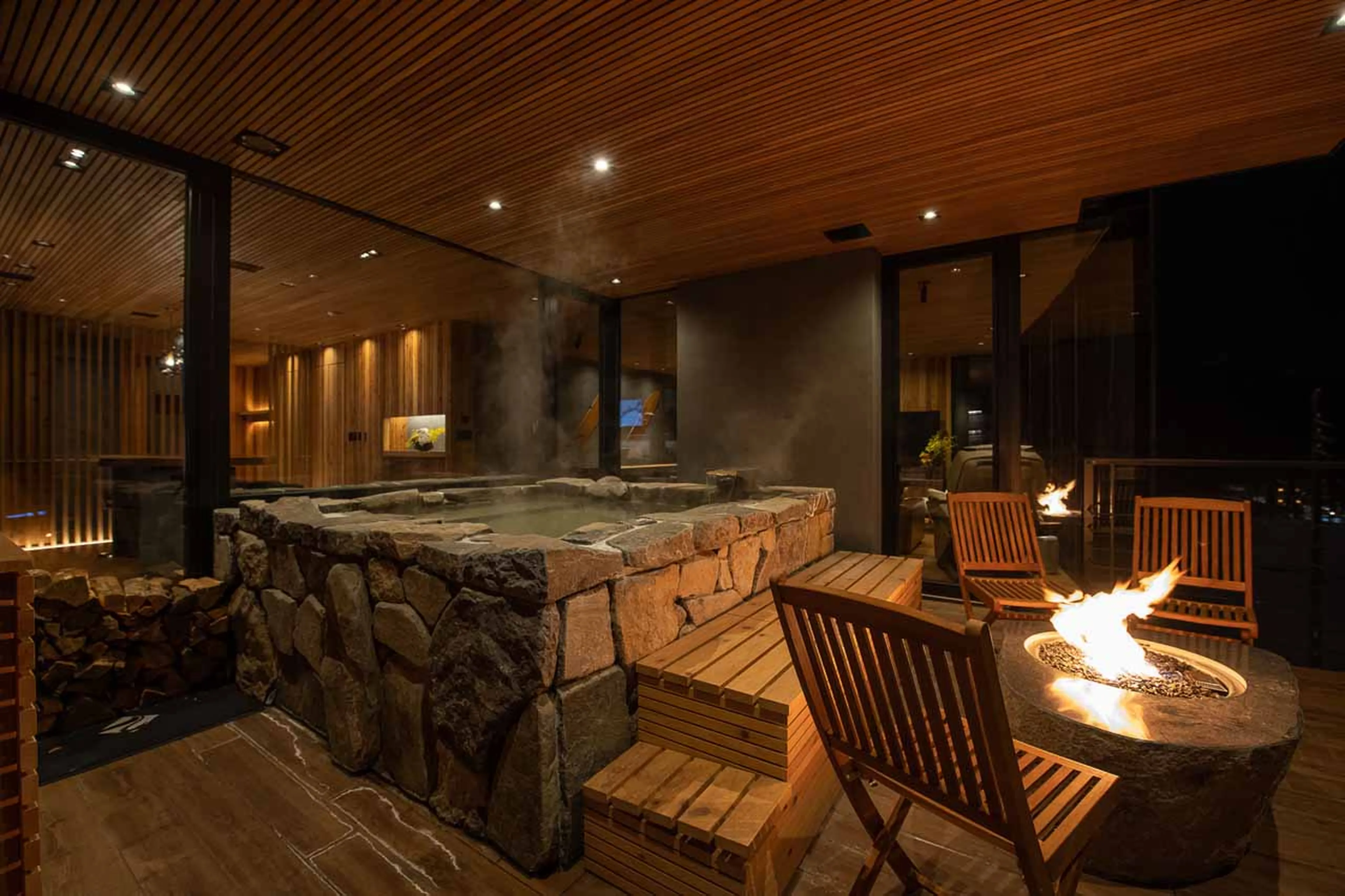 Firepit and onsen at HakuVillas in Niseko