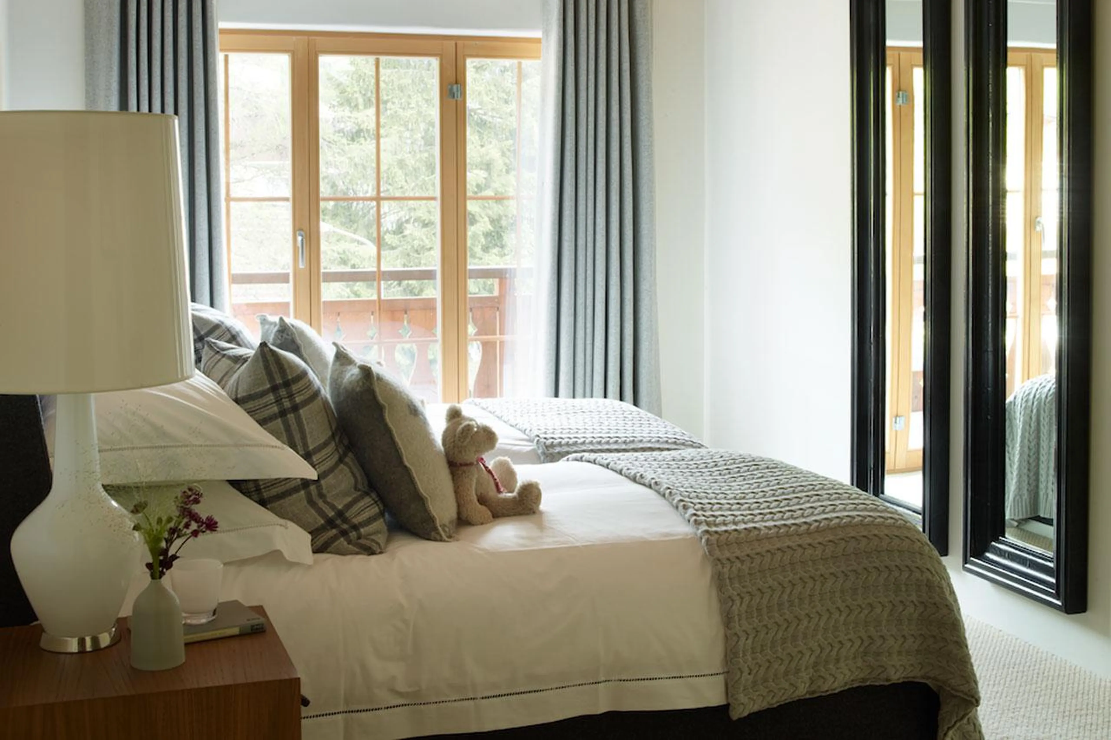 Balcony and twin bedroom at Haus Alpina I in Klosters