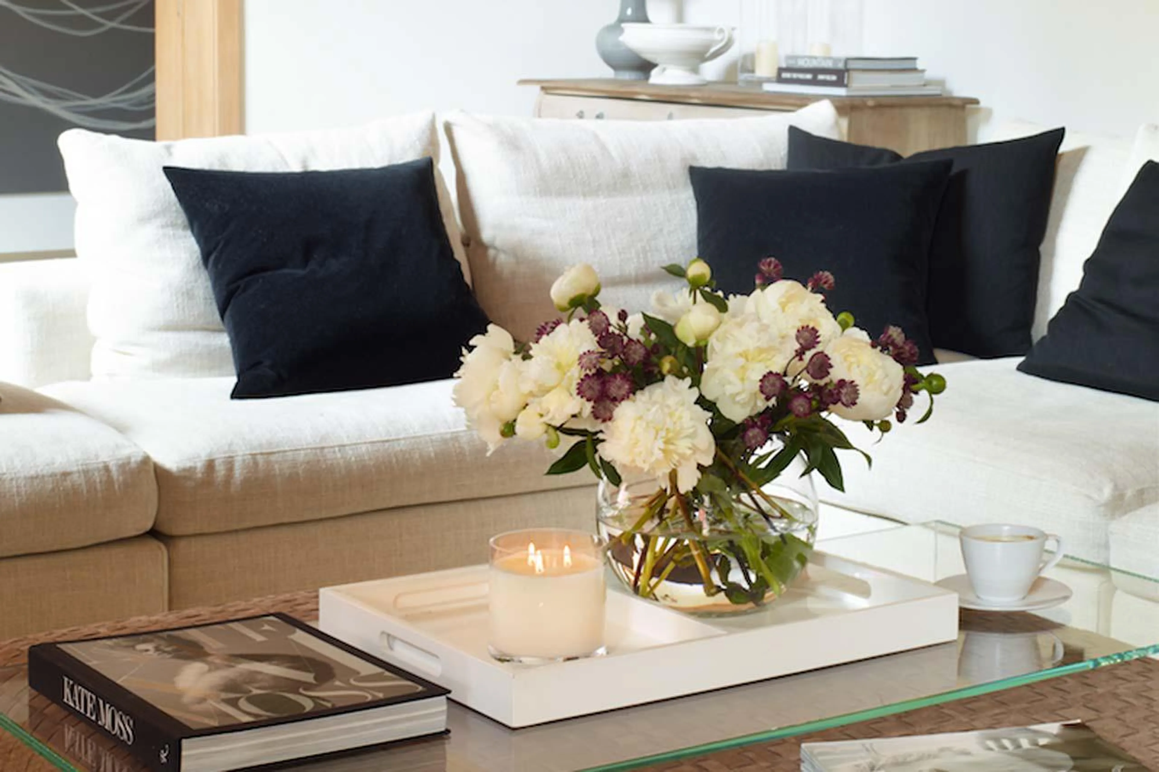 Comfortable couch in drawing room of Haus Alpina in Klosters