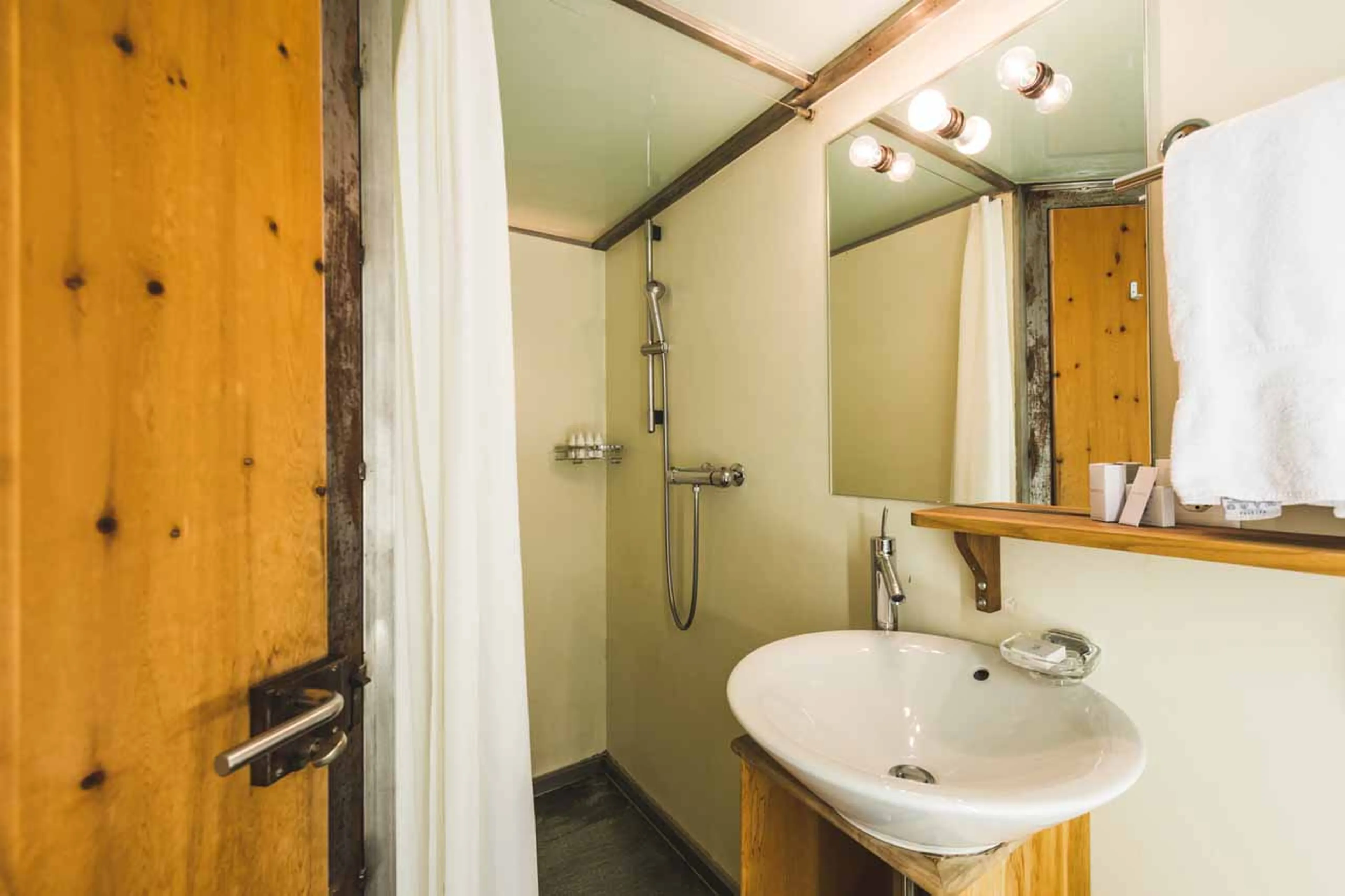 En-suite shower room at  Heinz Julen Loft in Zermatt