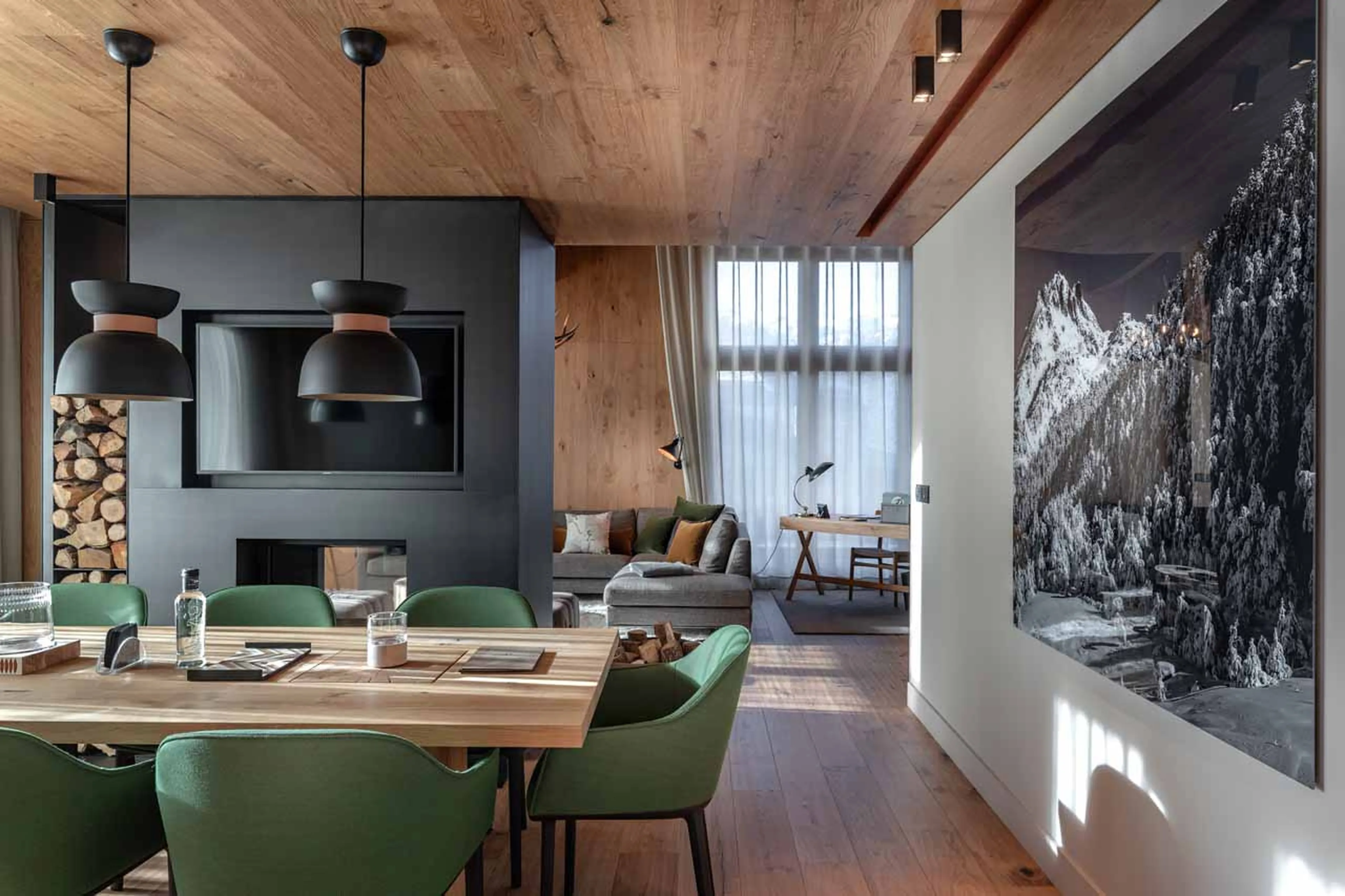 Dining table and TV at  Hermitage Mountain Residence 250 in Soleu