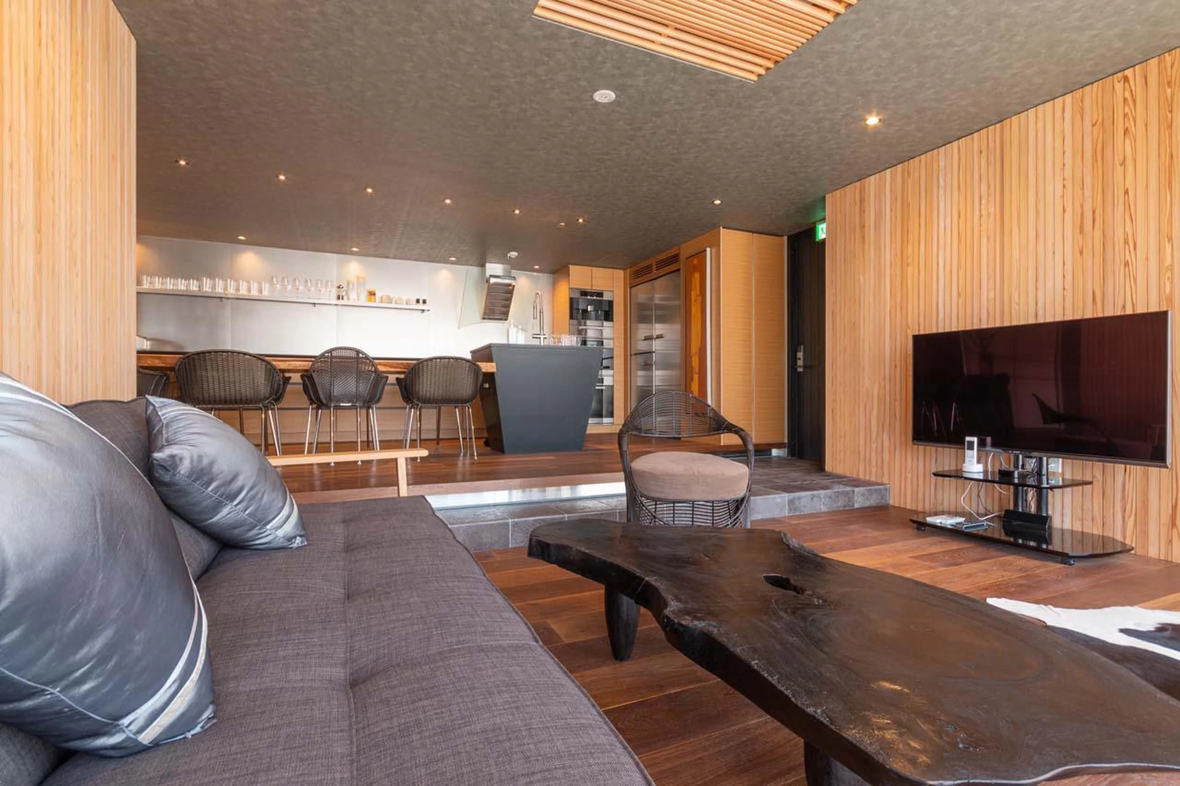 Sofas and TV within living area at Hideaway on Escarpment in Niseko