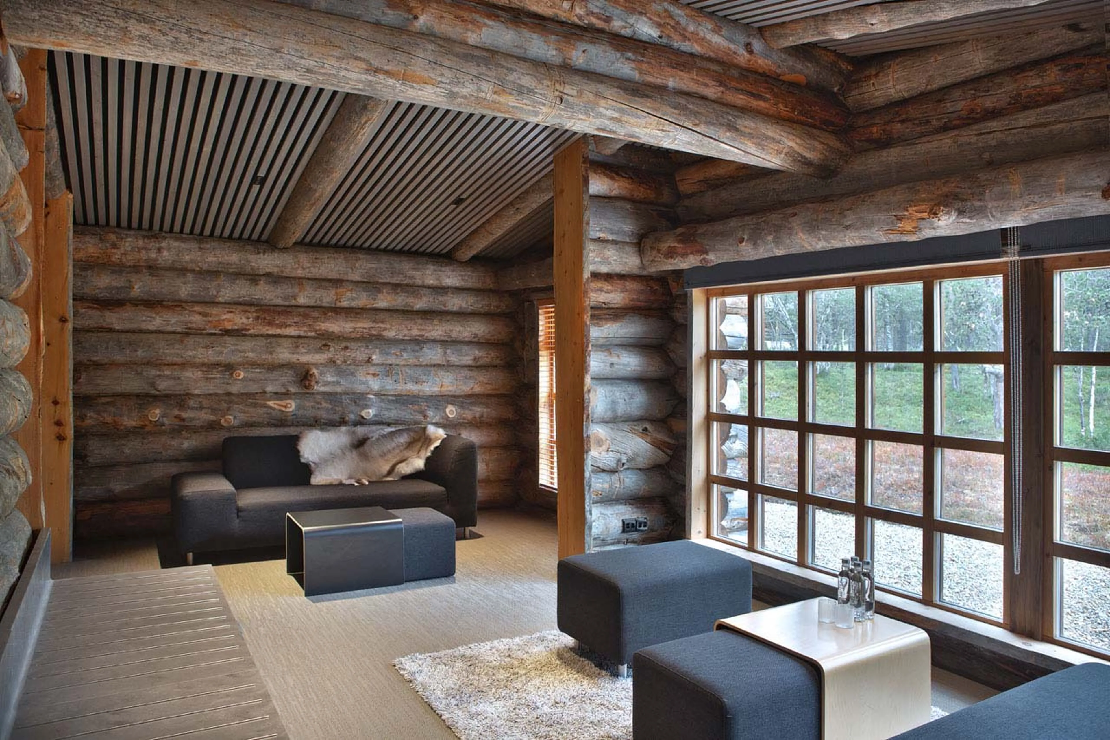 Lounge area in presidential suite at Javri Lodge in Finland