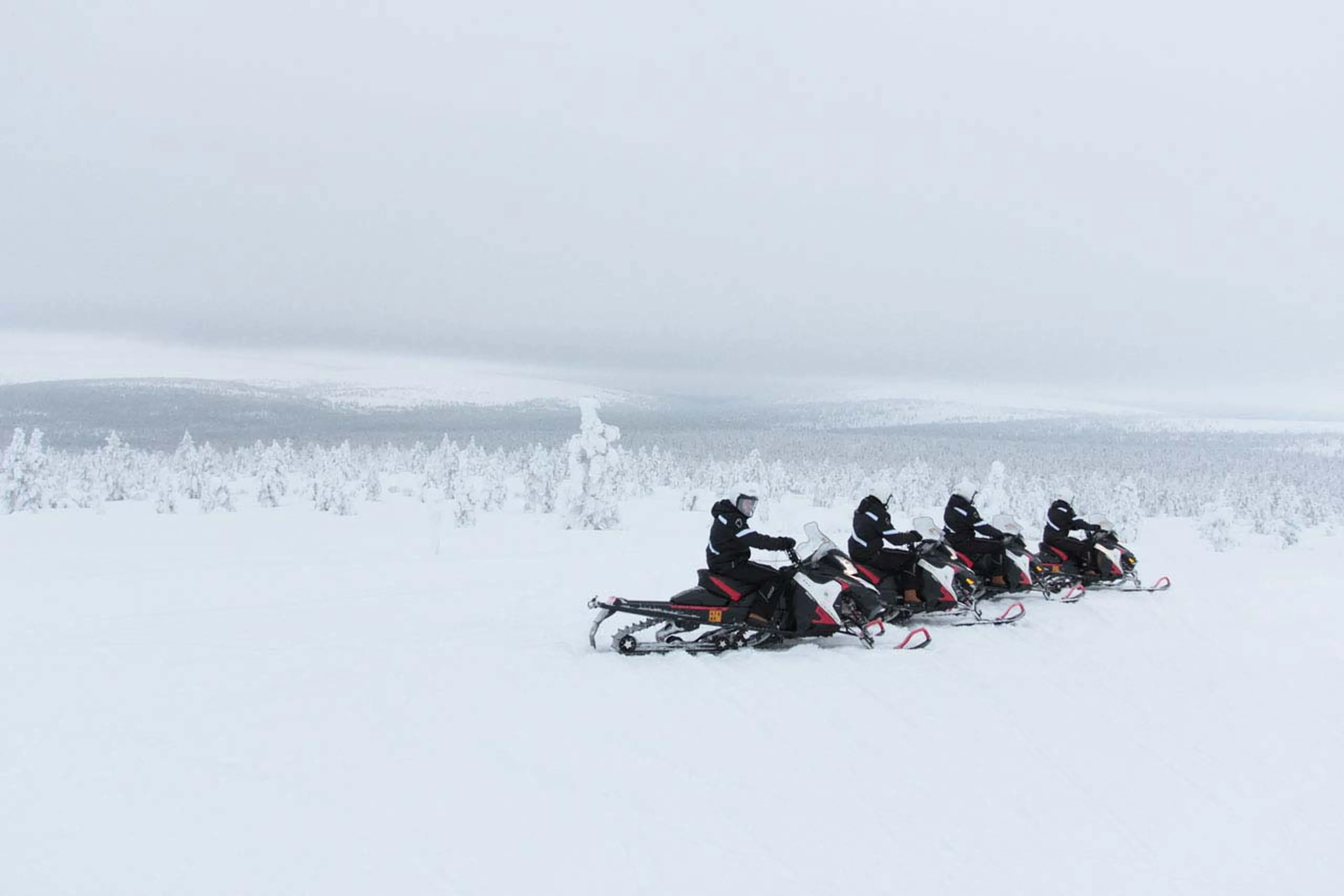 Snowmobile safari at Javri Lodge in Finland