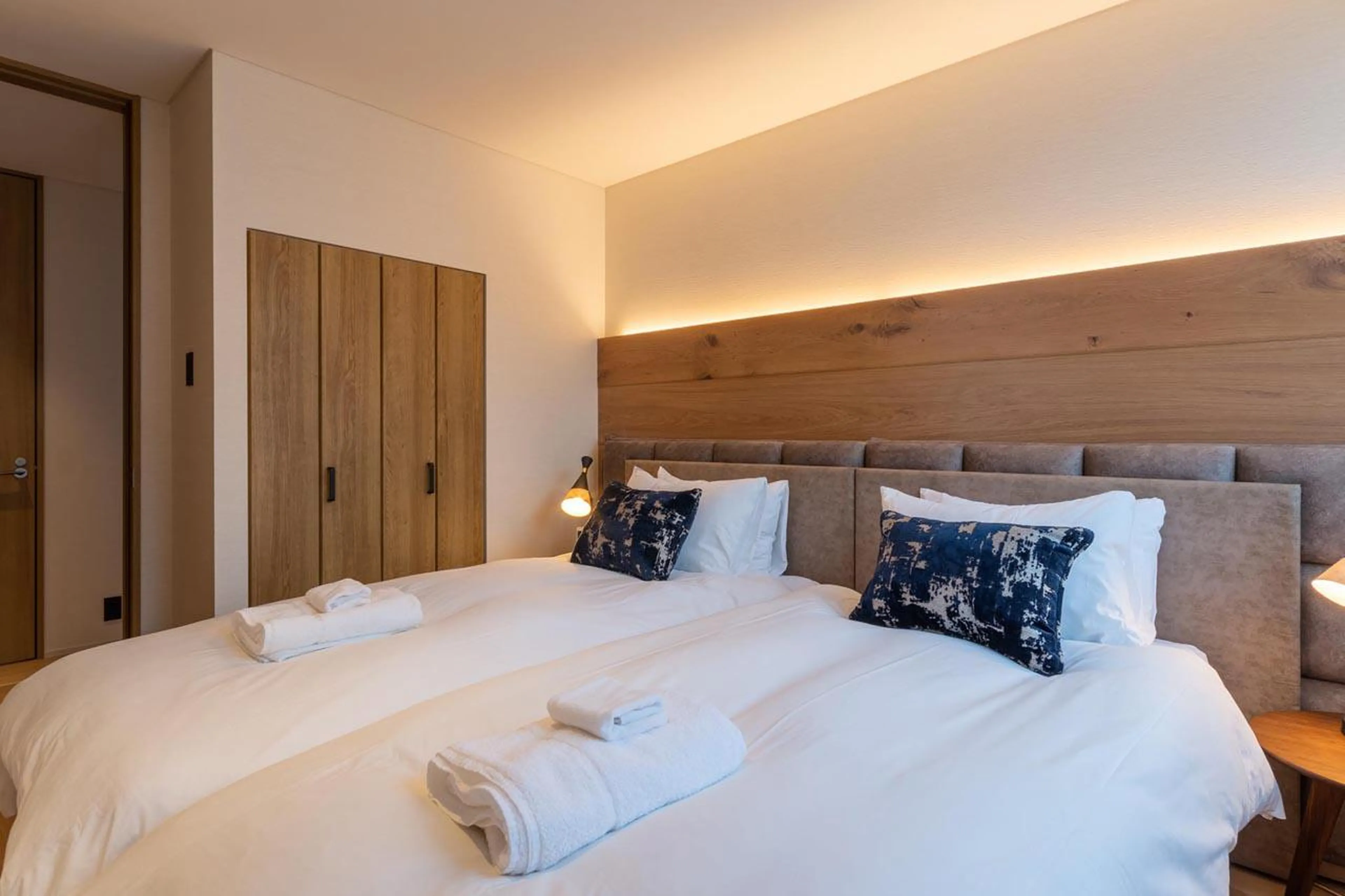 Bedroom with plentiful storage space at Koa Townhouse in Niseko