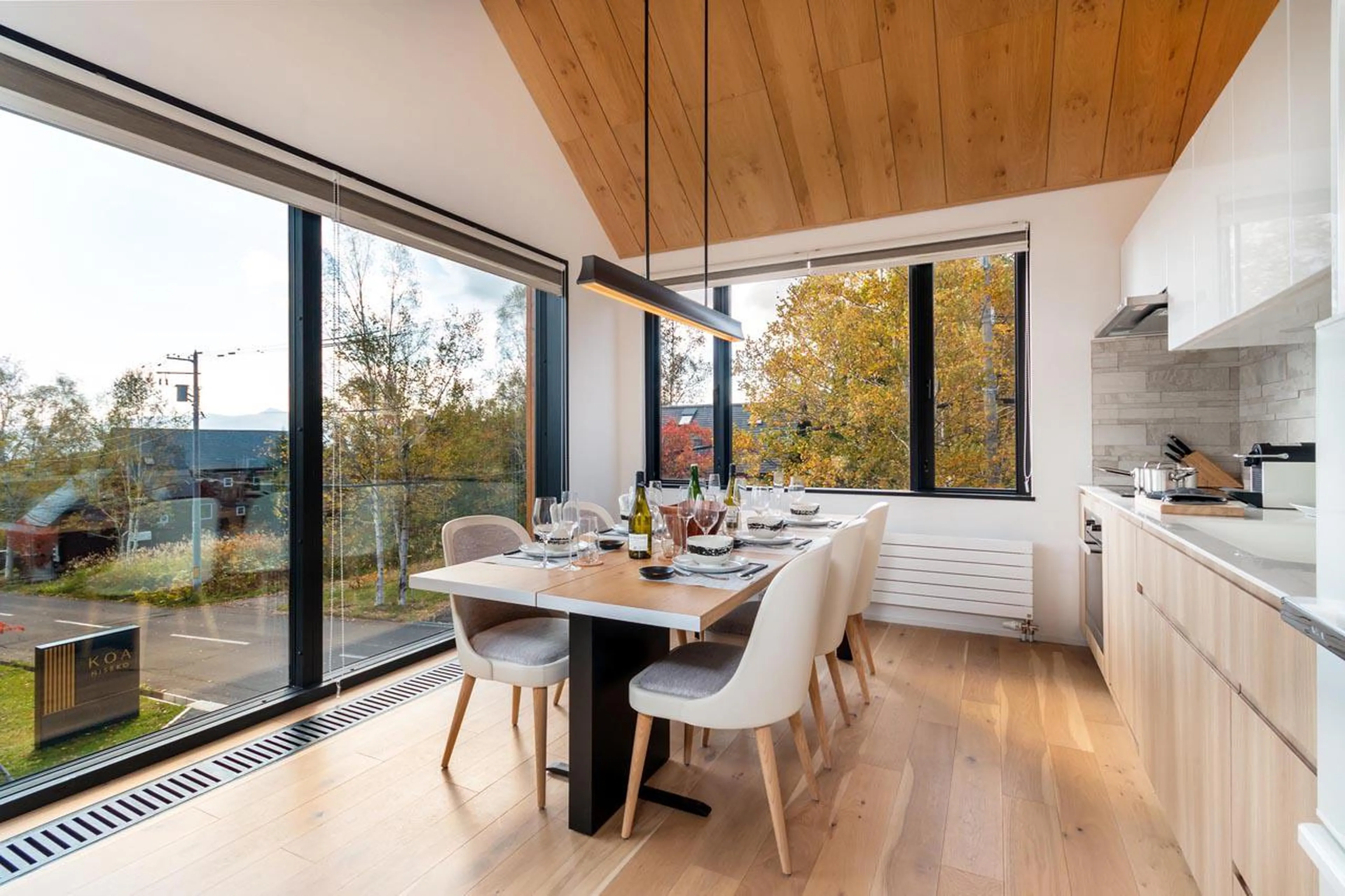 Dining table with views of Mount Yotei at Koa Townhouse in Niseko
