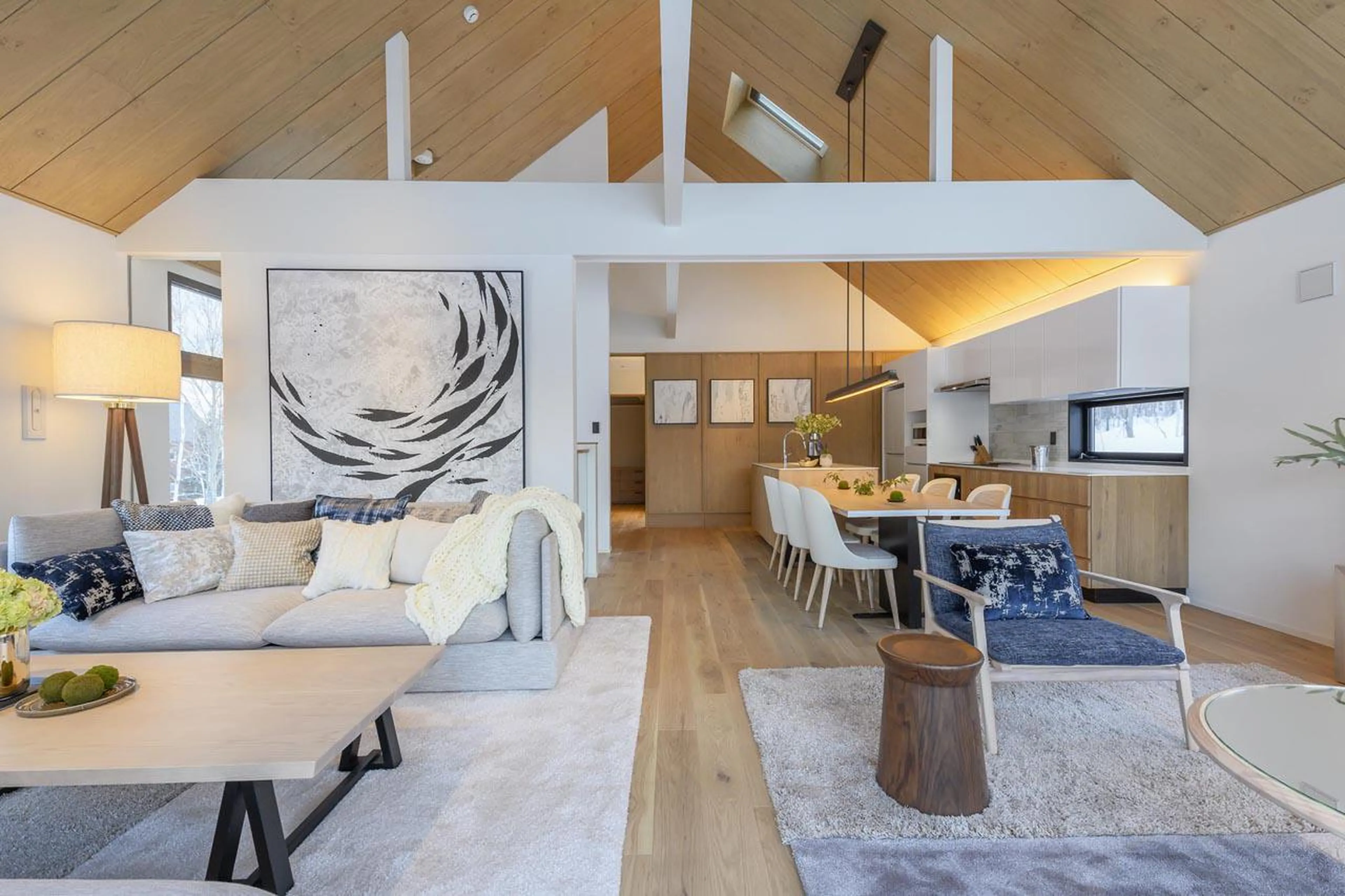 Spacious and bright open-plan living area at Koa Villa in Niseko