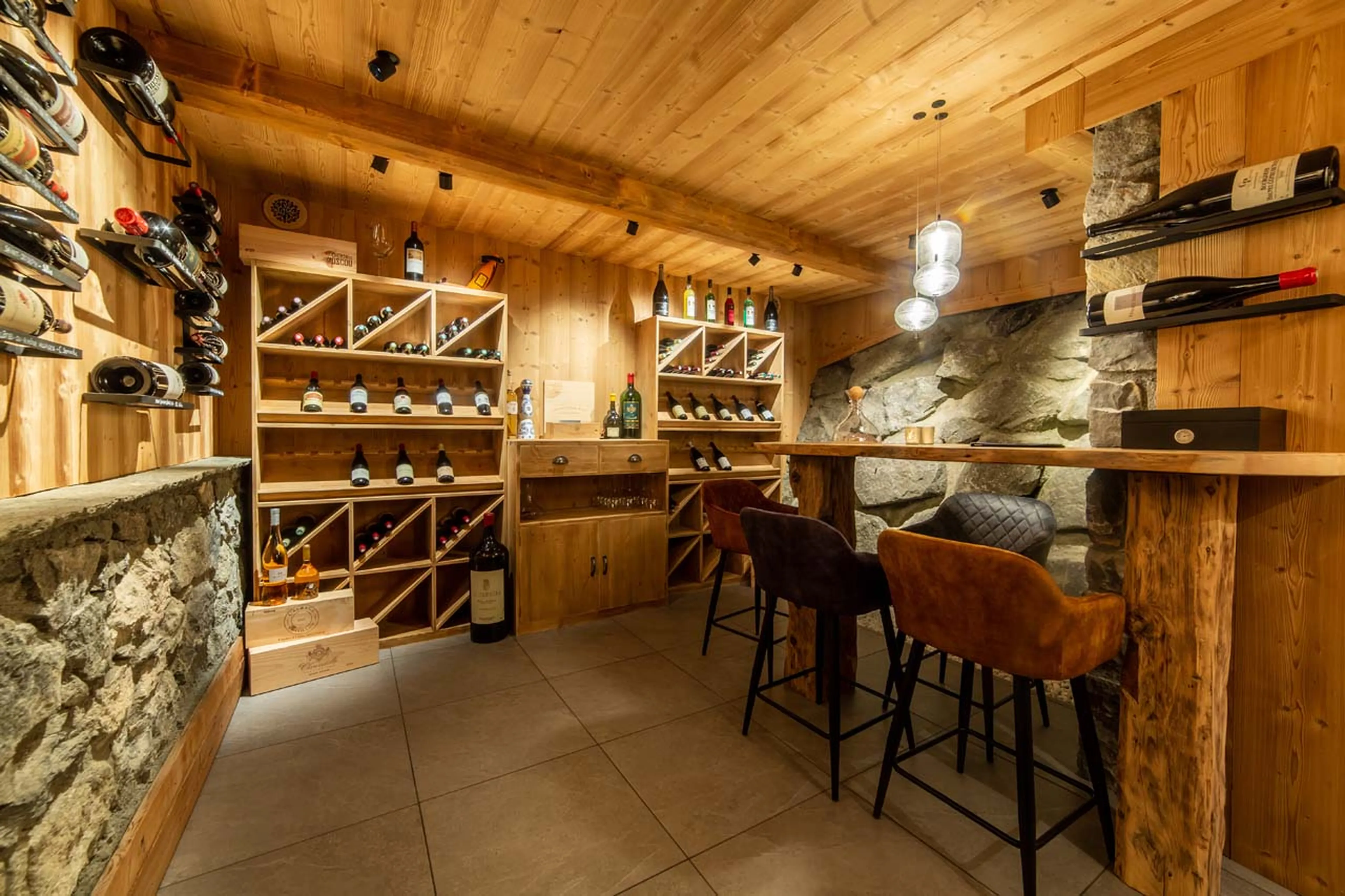 Wine cellar with bar at La Ferme de Mon Grand Pere in Meribel
