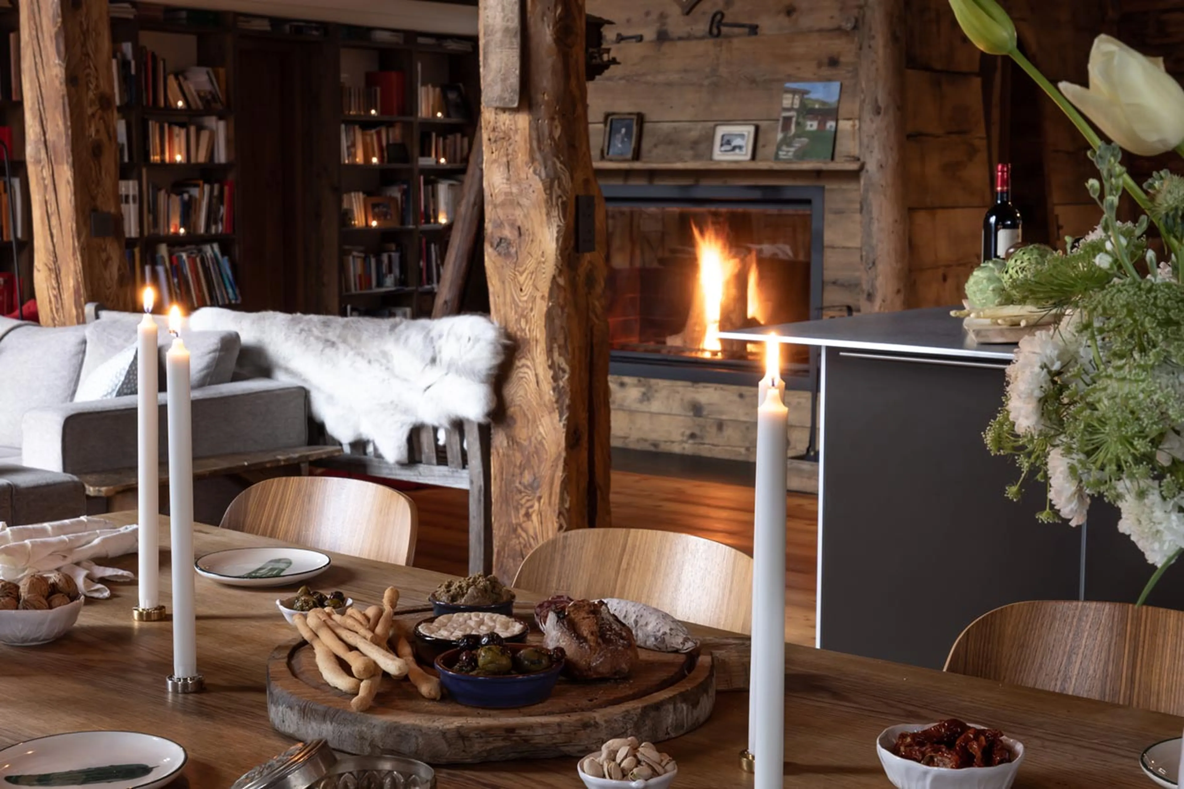 Dining table and fireplace in La Ferme des Frasserands, Chamonix