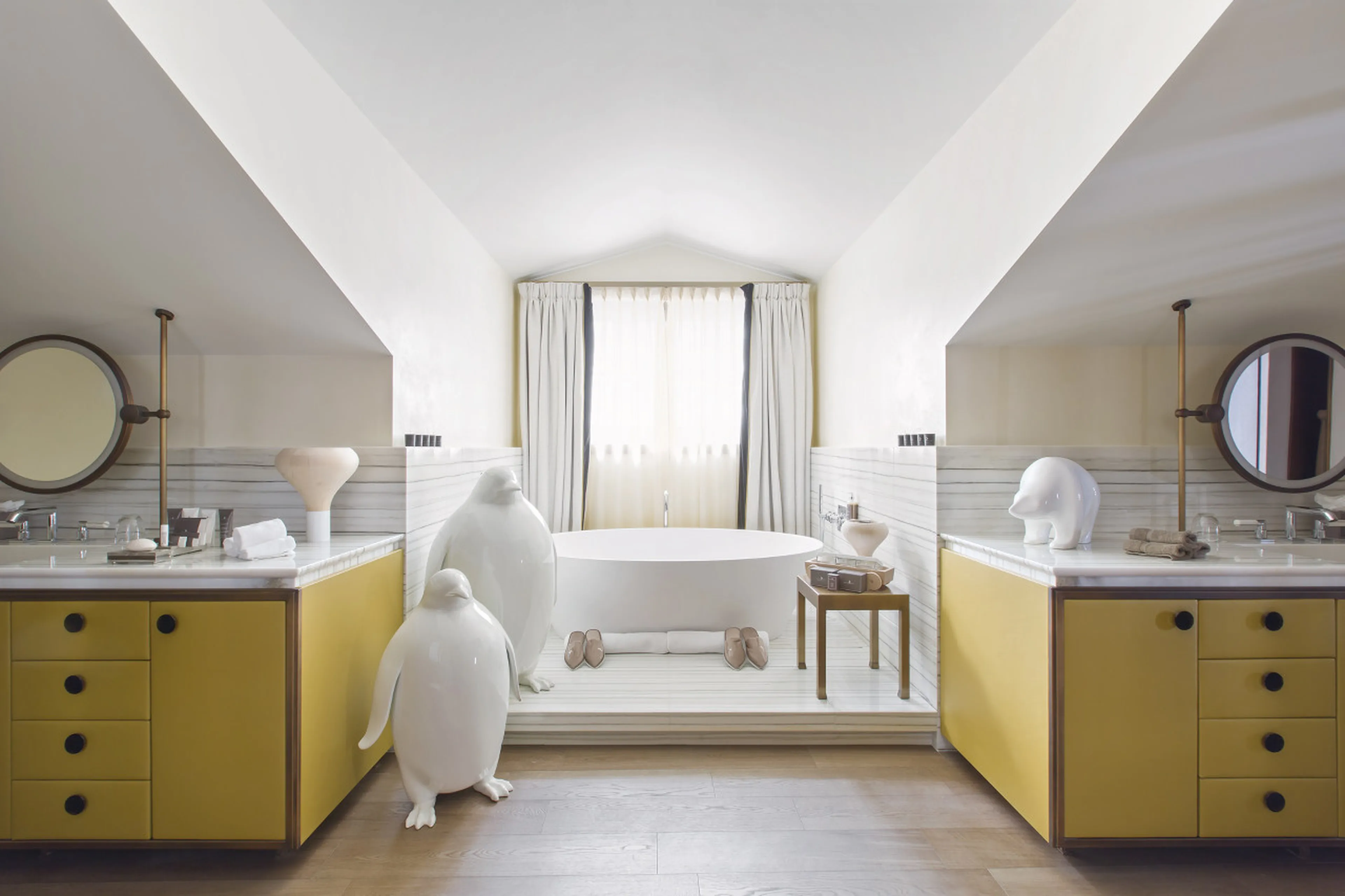 En suite bathroom with bath tub and hammam shower in Le Chalet Cheval Blanc in Courchevel 1850