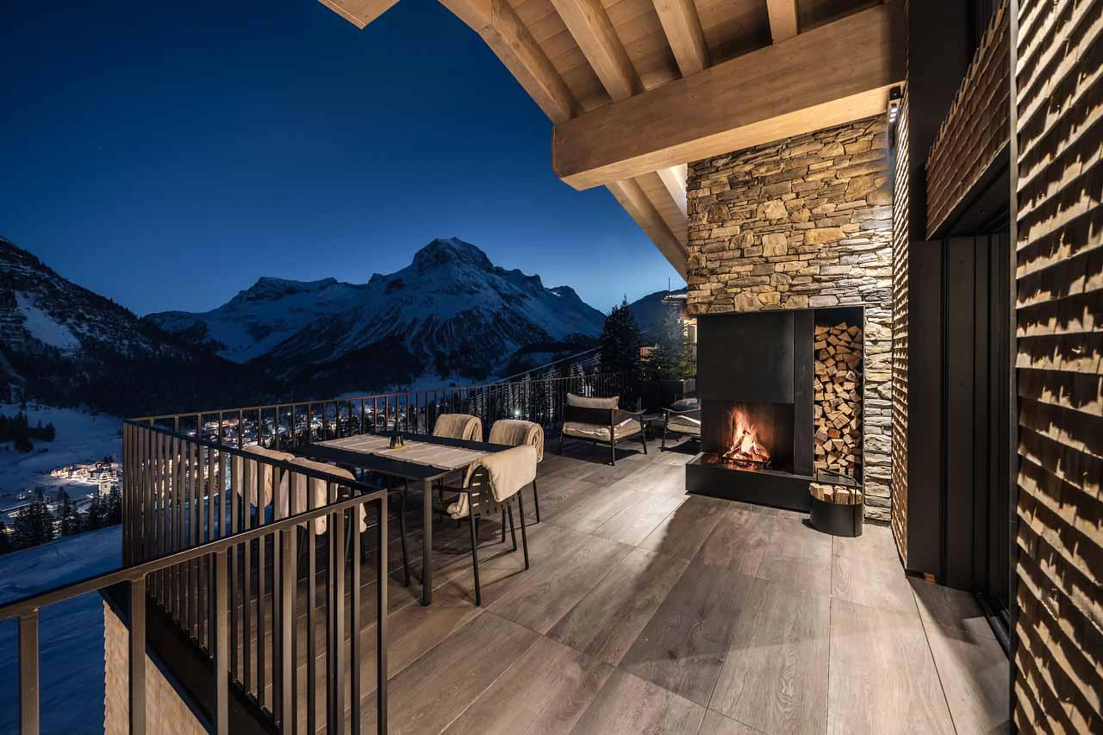 Terrace with outdoor fireplace in Le Chalet, Lech