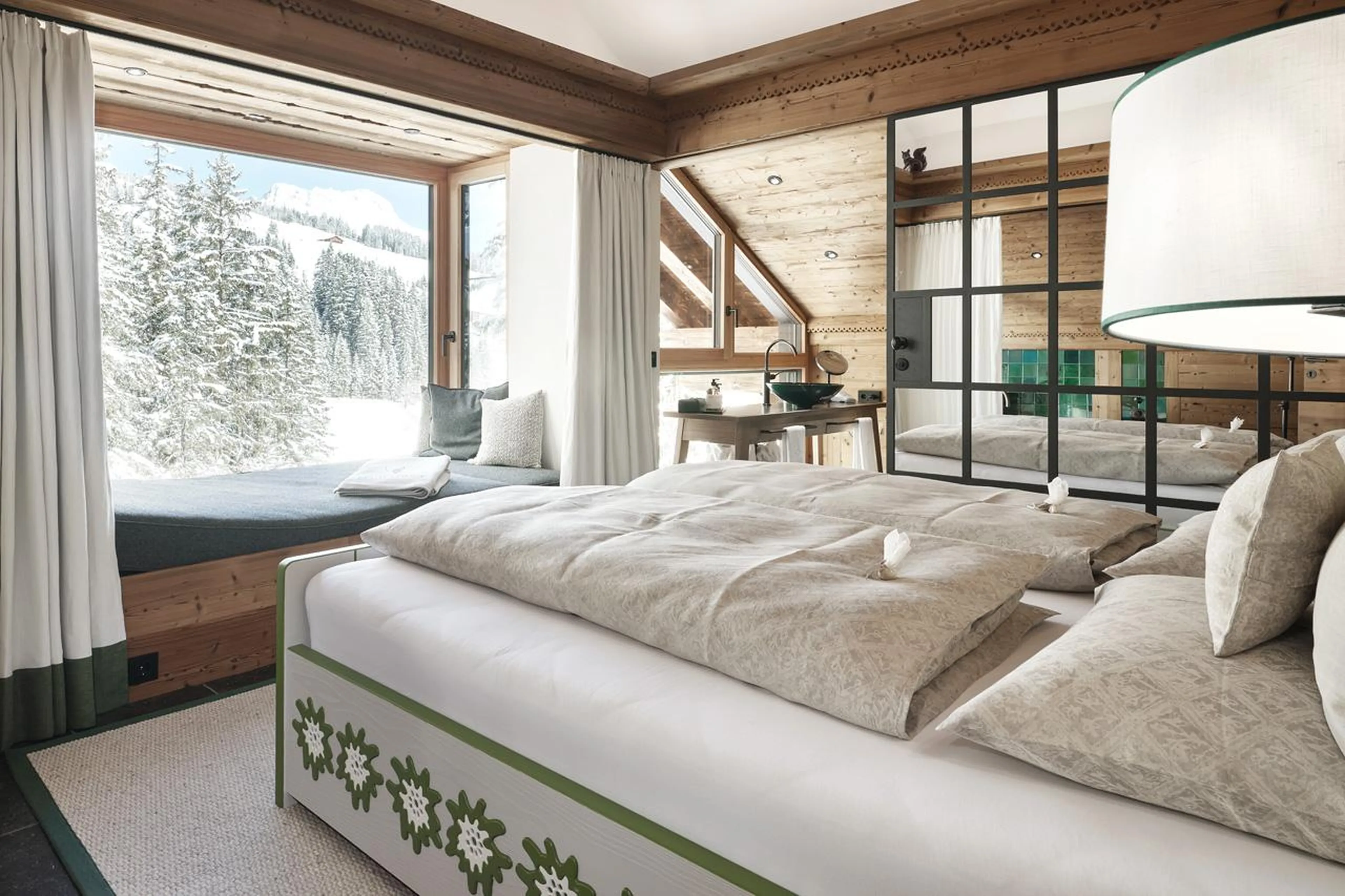 Double bedroom with window seat and open en-suite in Lech Lodge Loft, Lech