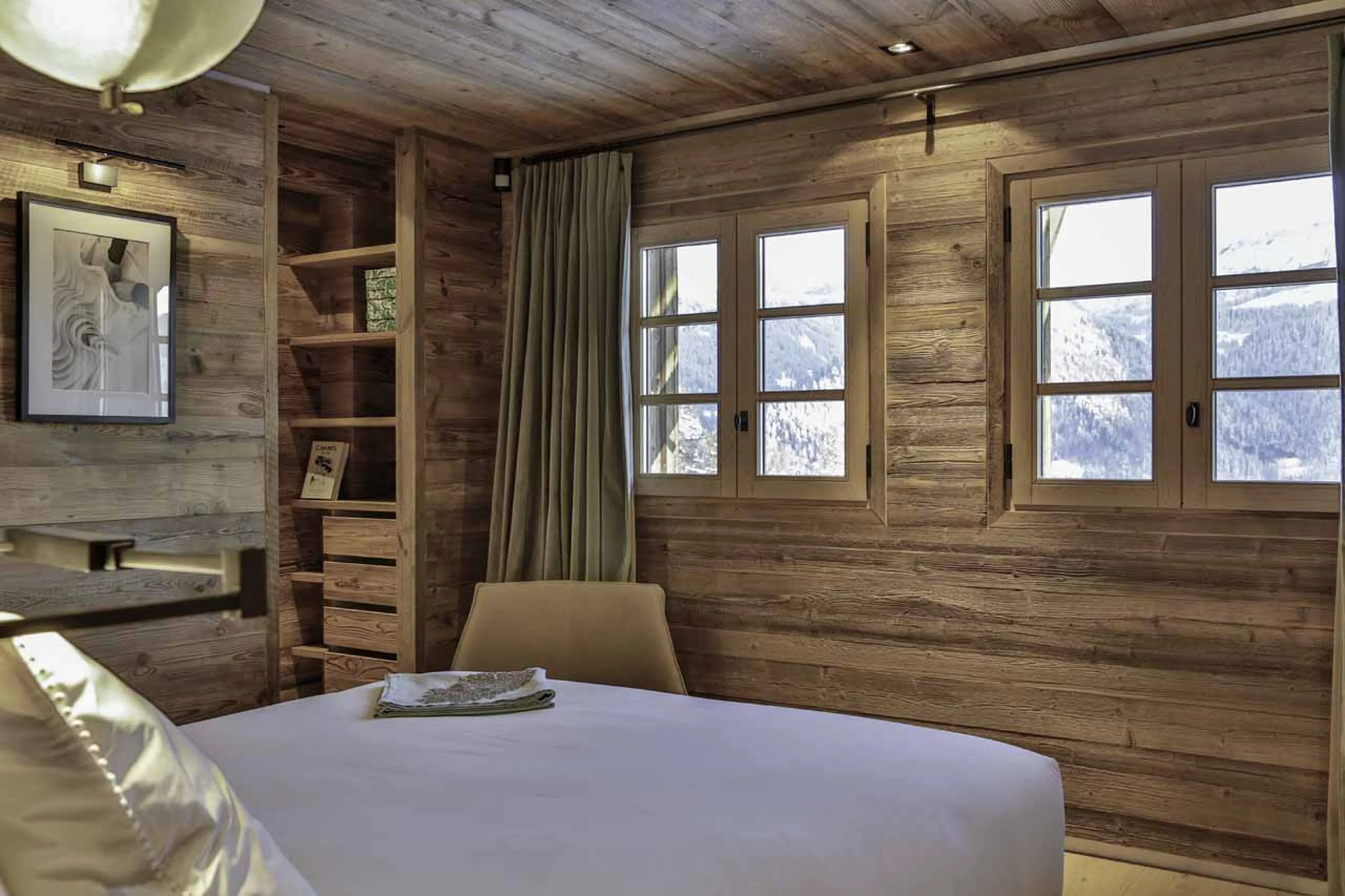 Mountain views from bedroom two at La Fermes a la Leonthine in Megeve