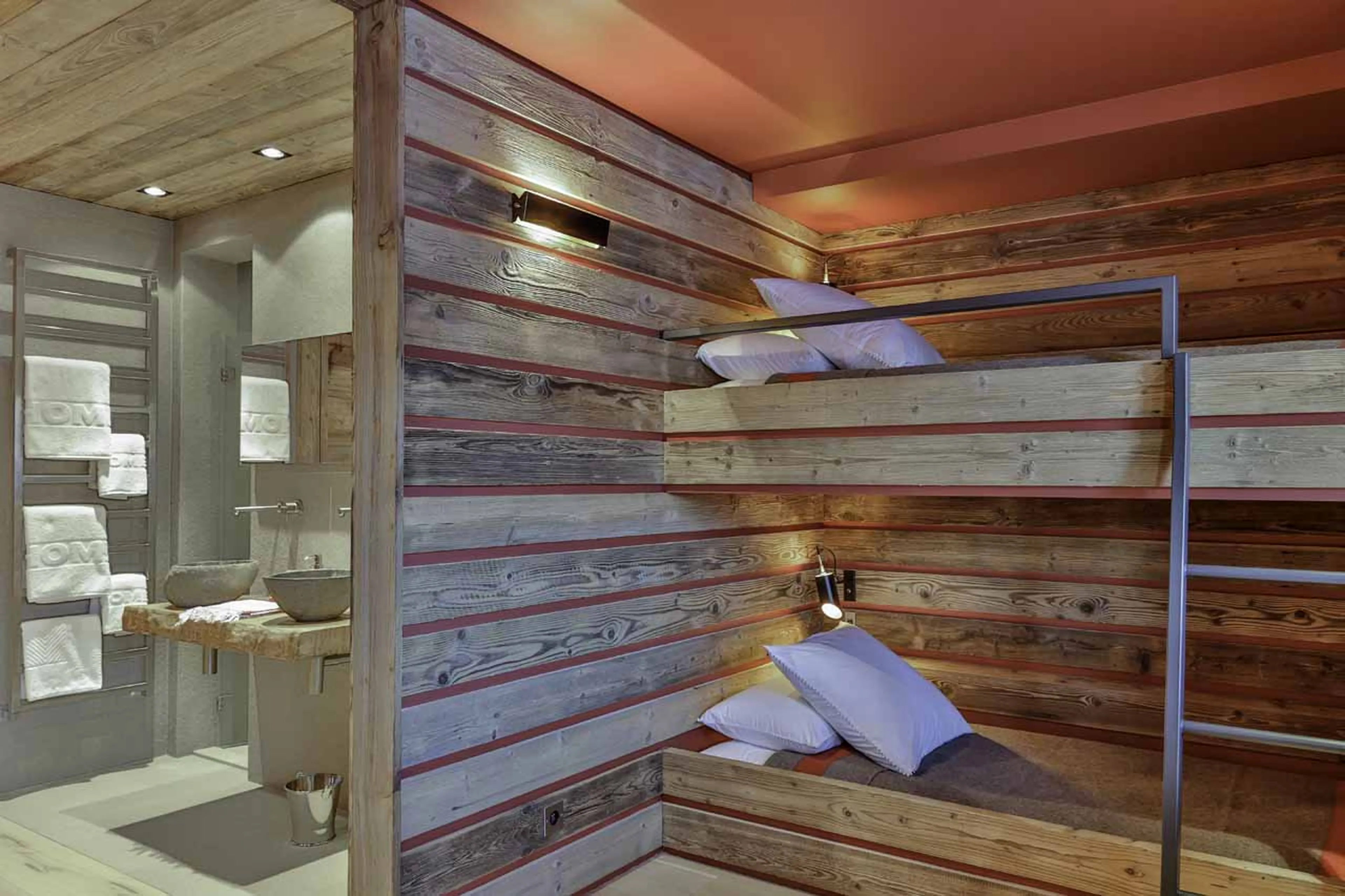 Bunk beds and bathroom at La Fermes a la Leonthine in Megeve