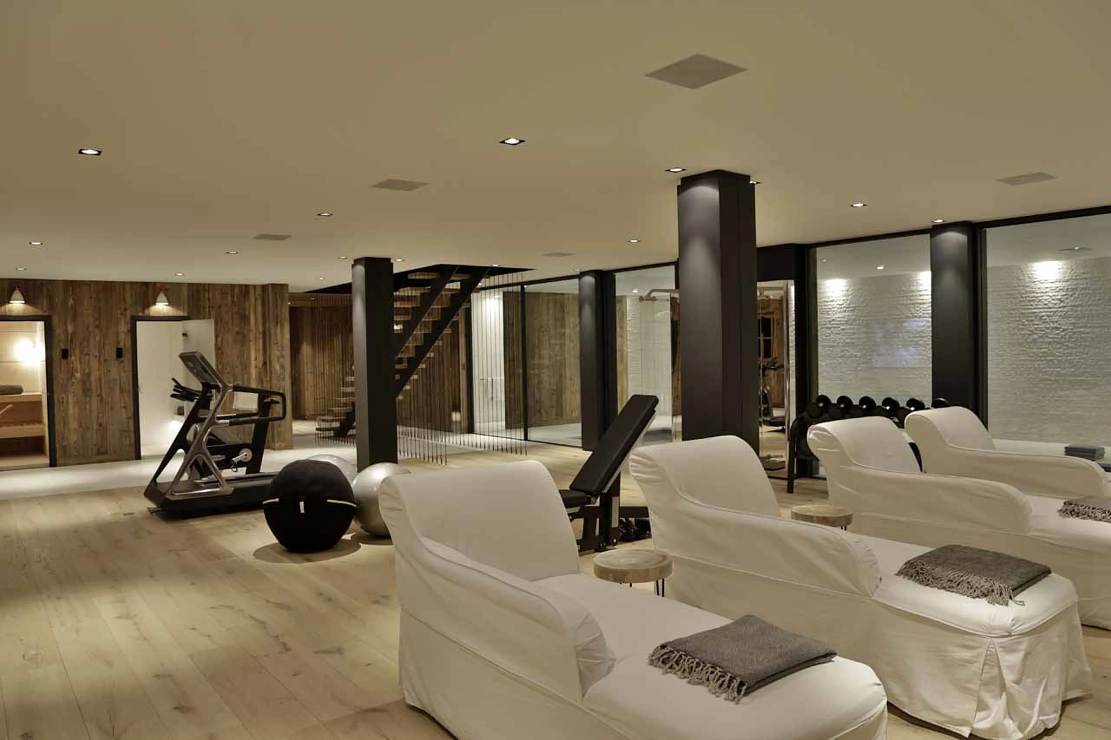 Relaxation area and gym at La Fermes a la Leonthine in Megeve
