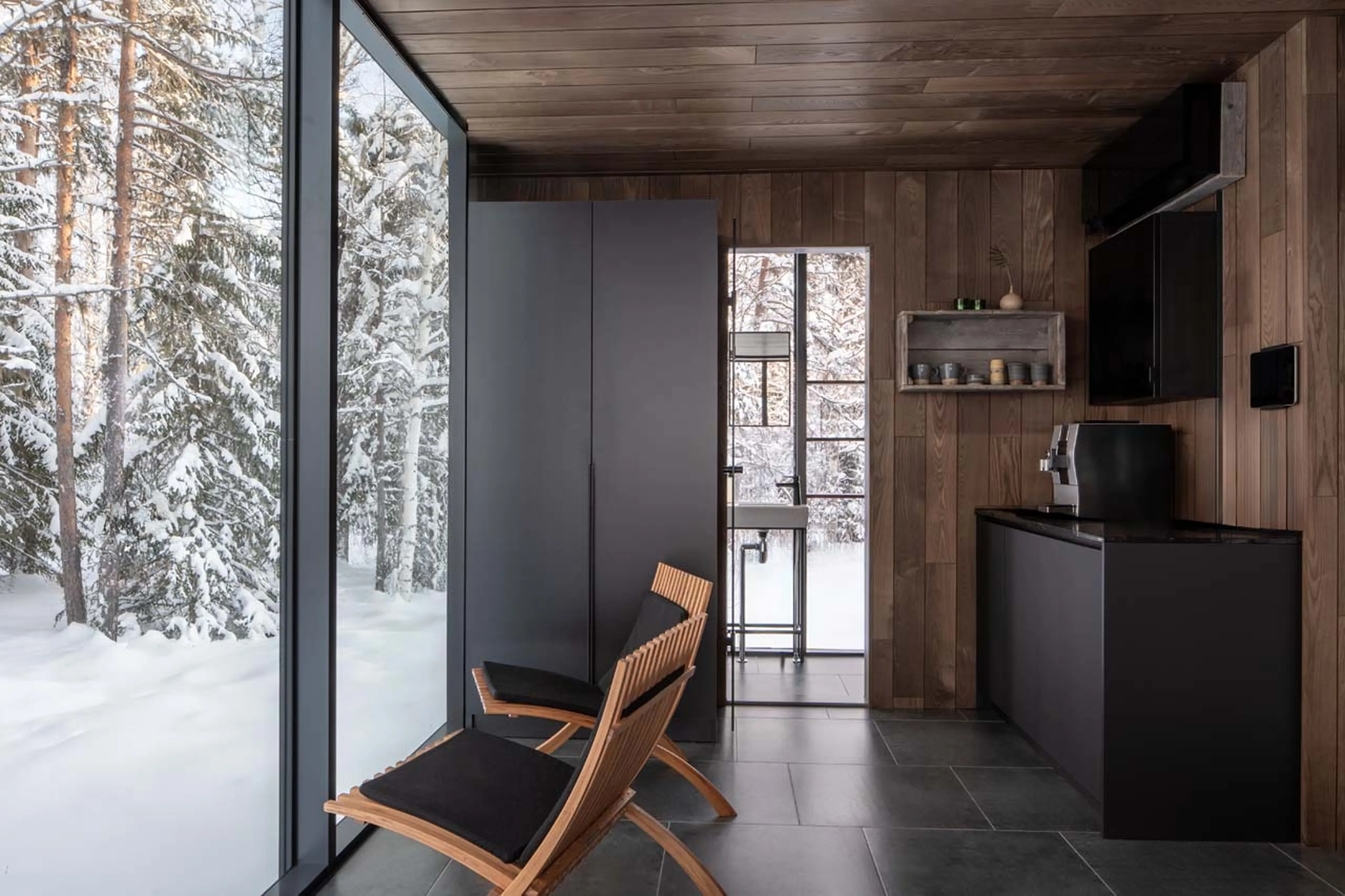 Chairs in glass pod at Logger's Lodge in Sweden