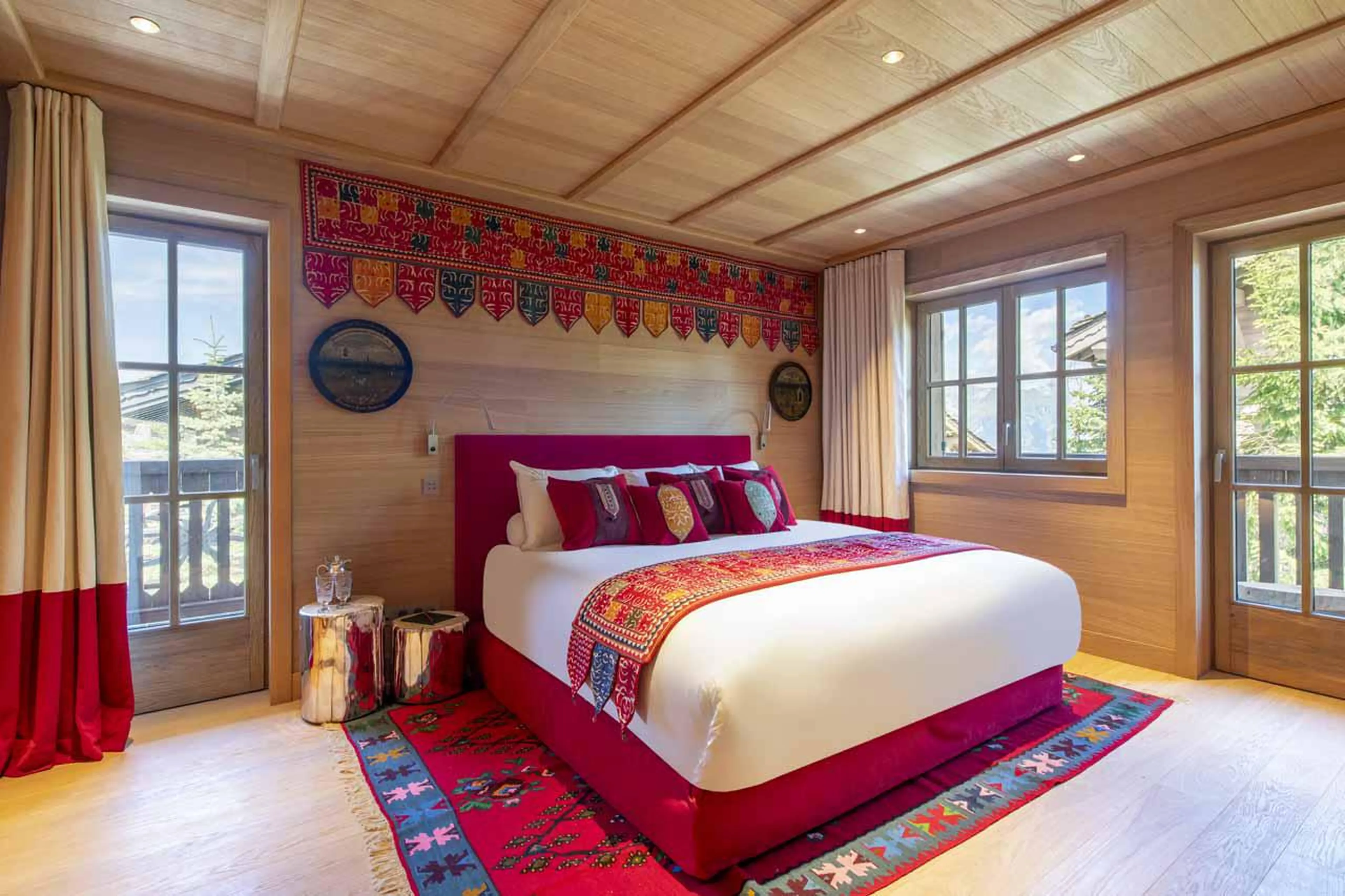 Master double bedroom with TV, dressing room and balcony access in Lord of Snow, Courchevel 1850