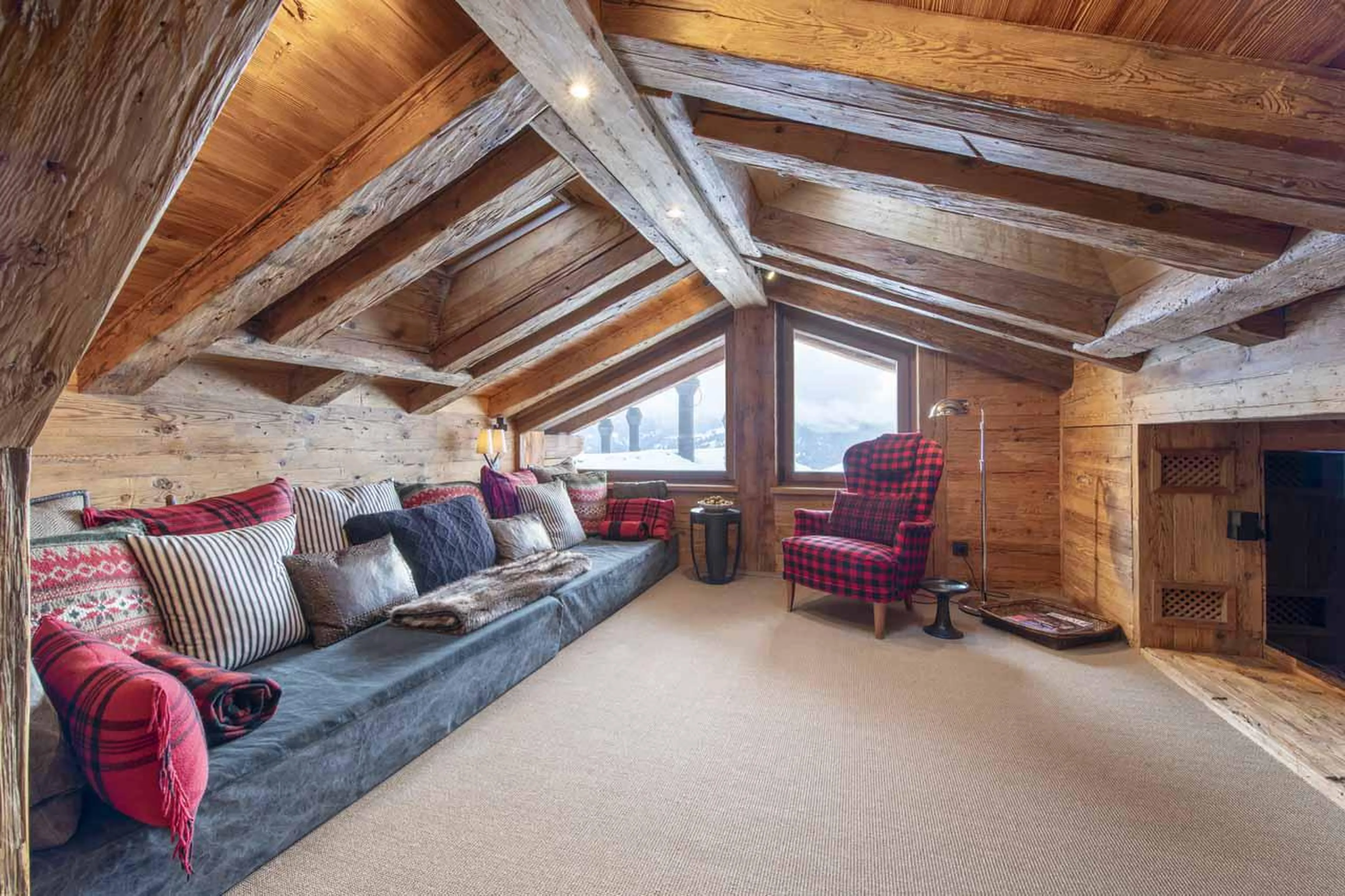 Spacious and cosy sofa space at Marmotte Penthouse in Verbier