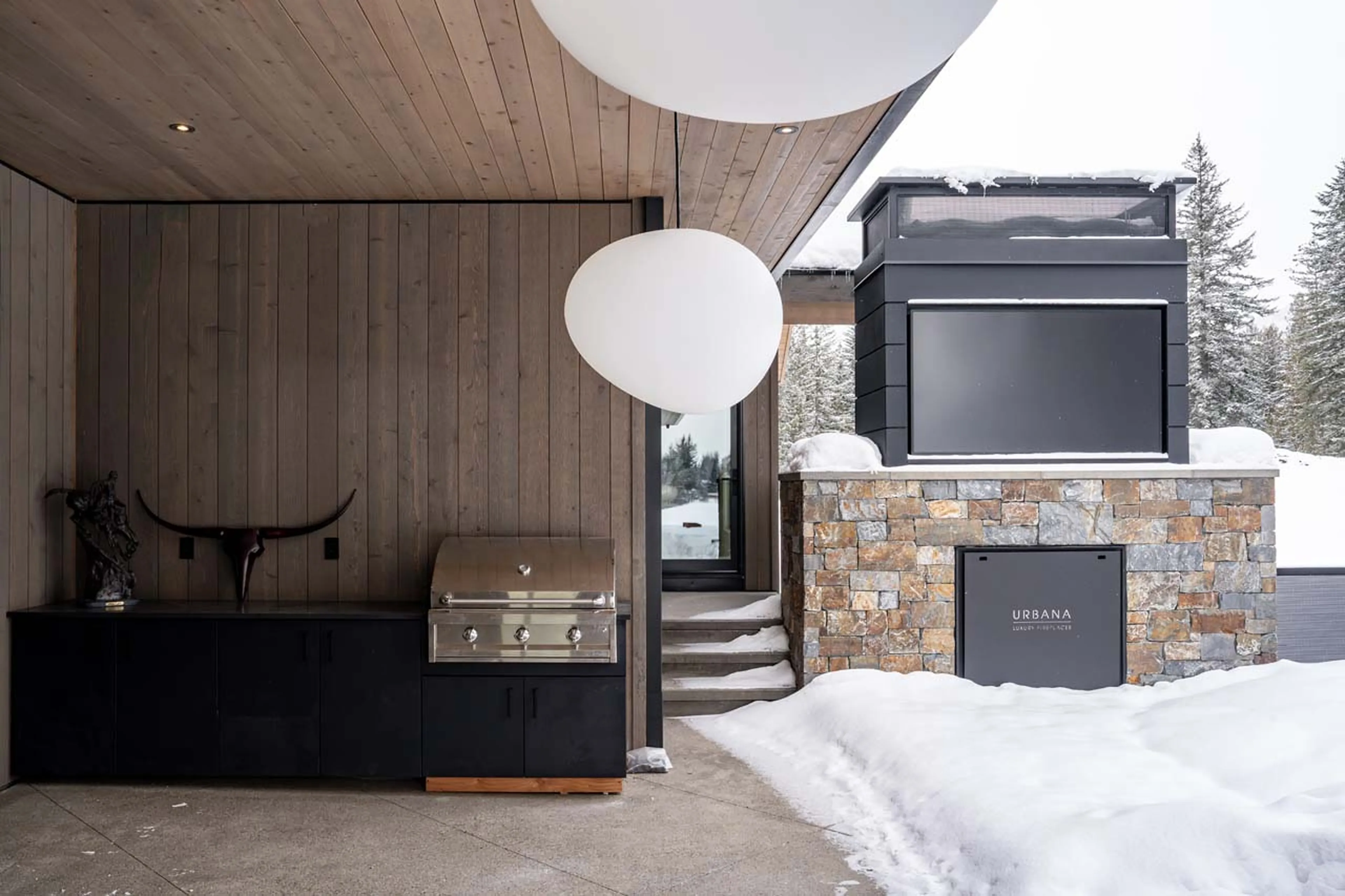 BBQ and covered outdoor area in Mountain Lake Chalet, Revelstoke