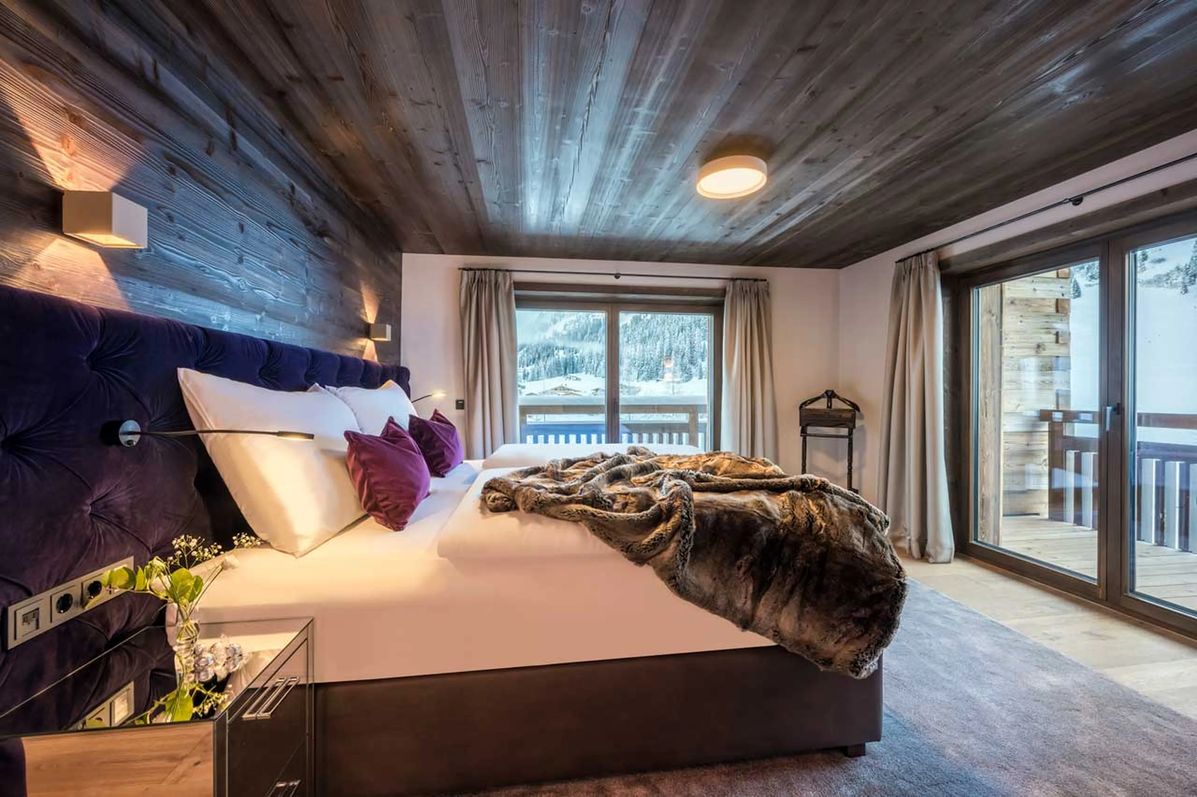 Master double bedroom with terrace access in Nidus Apartment 3 in Lech
