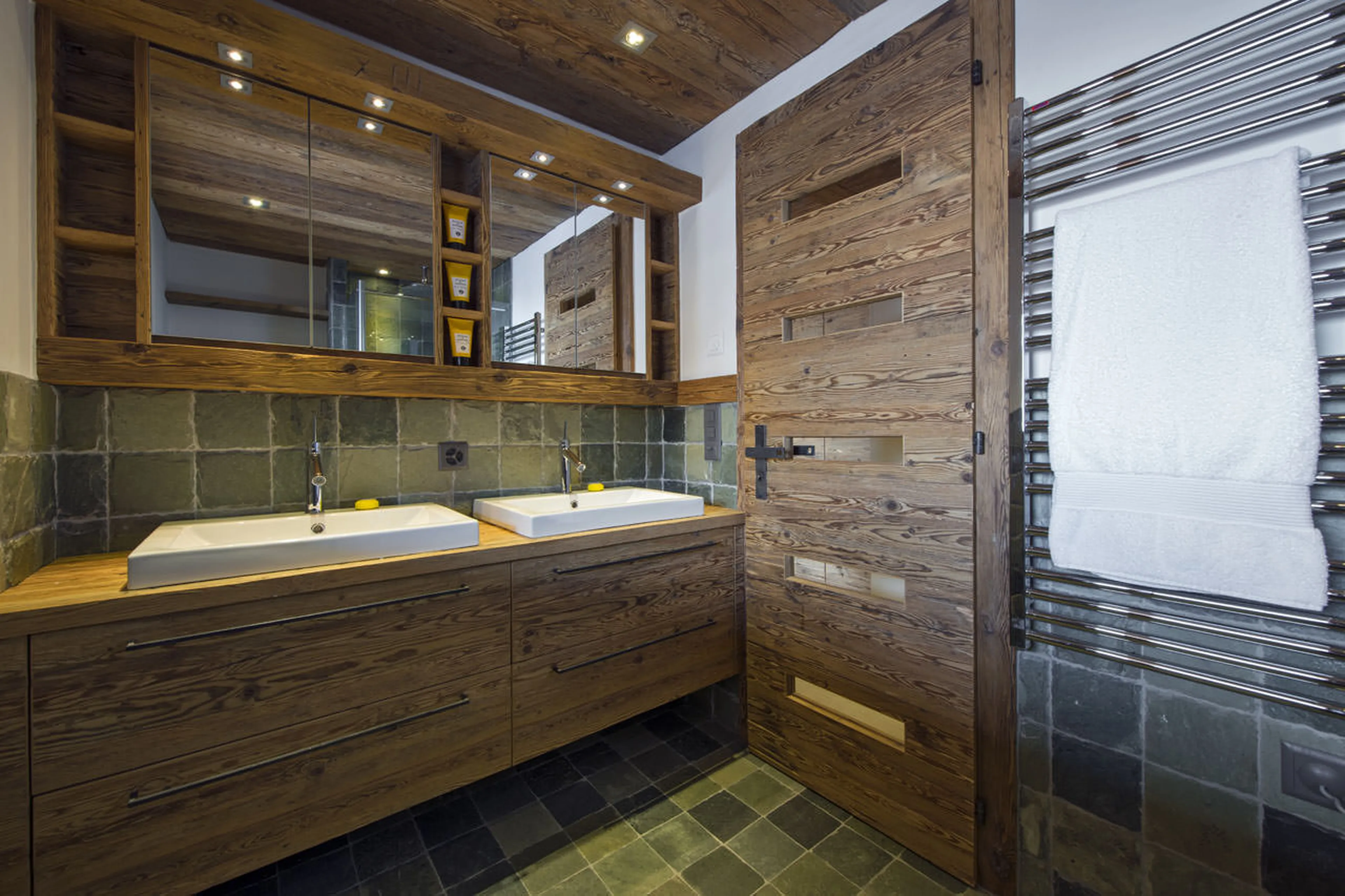 Master bathroom with twin basins in Exterior of No. 5 Apartment 4 in Verbier