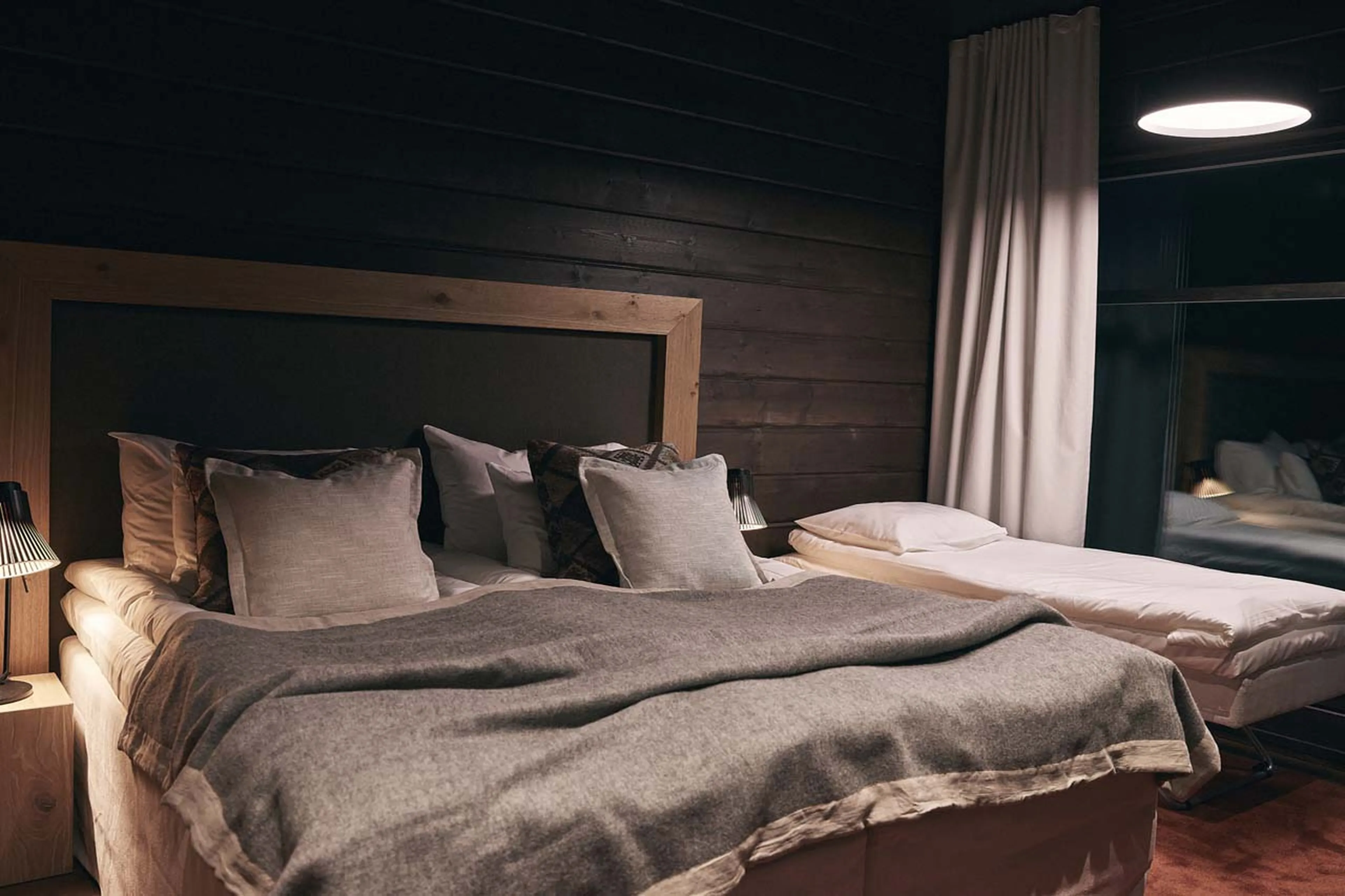 Extra bed in double bedroom at Octola Private Wilderness in Finland