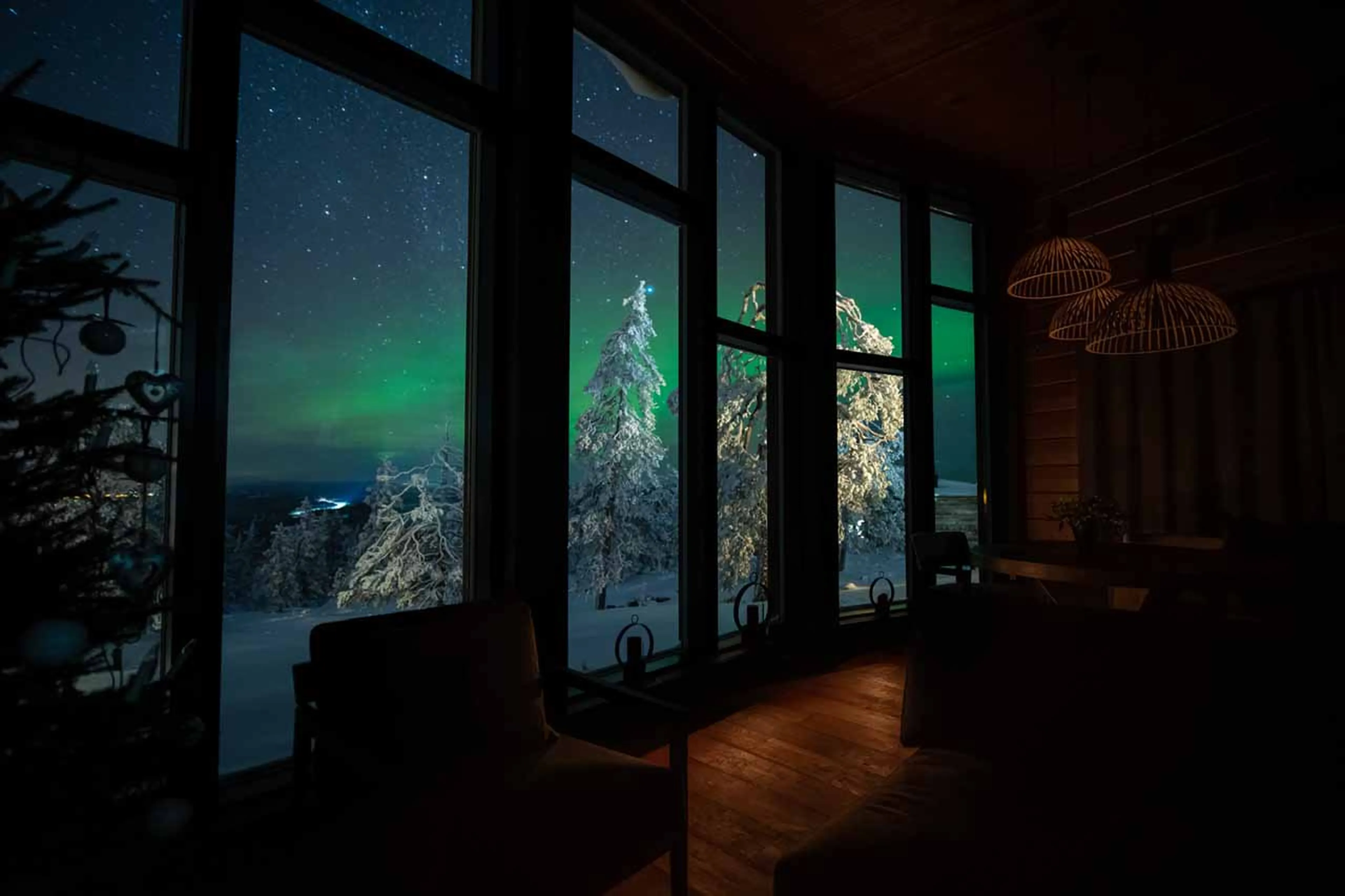 Northern lights from living area at Octola Villa in Arctic Finland