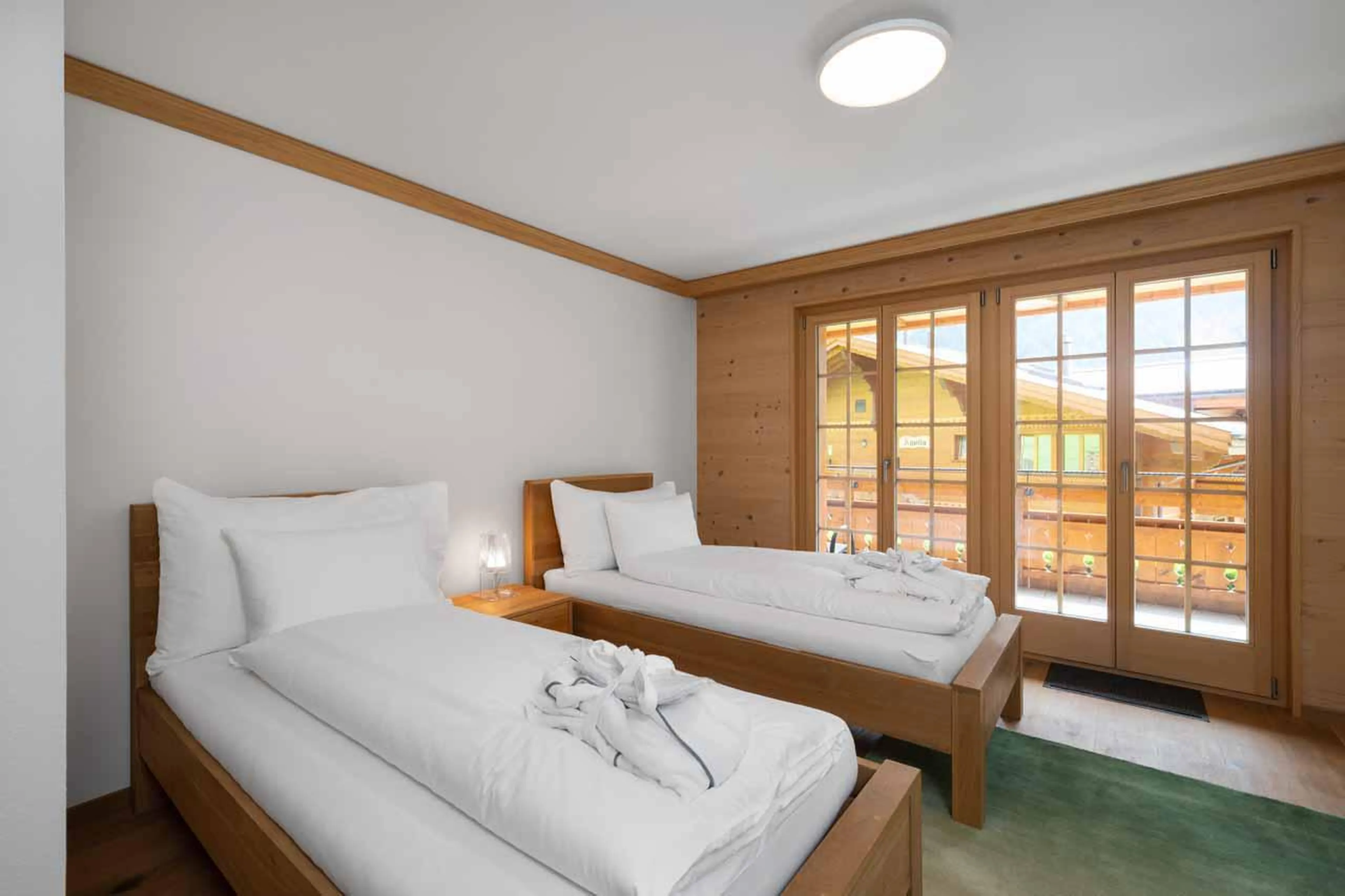 First floor twin bedroom at Chalet Alia in Grindelwald