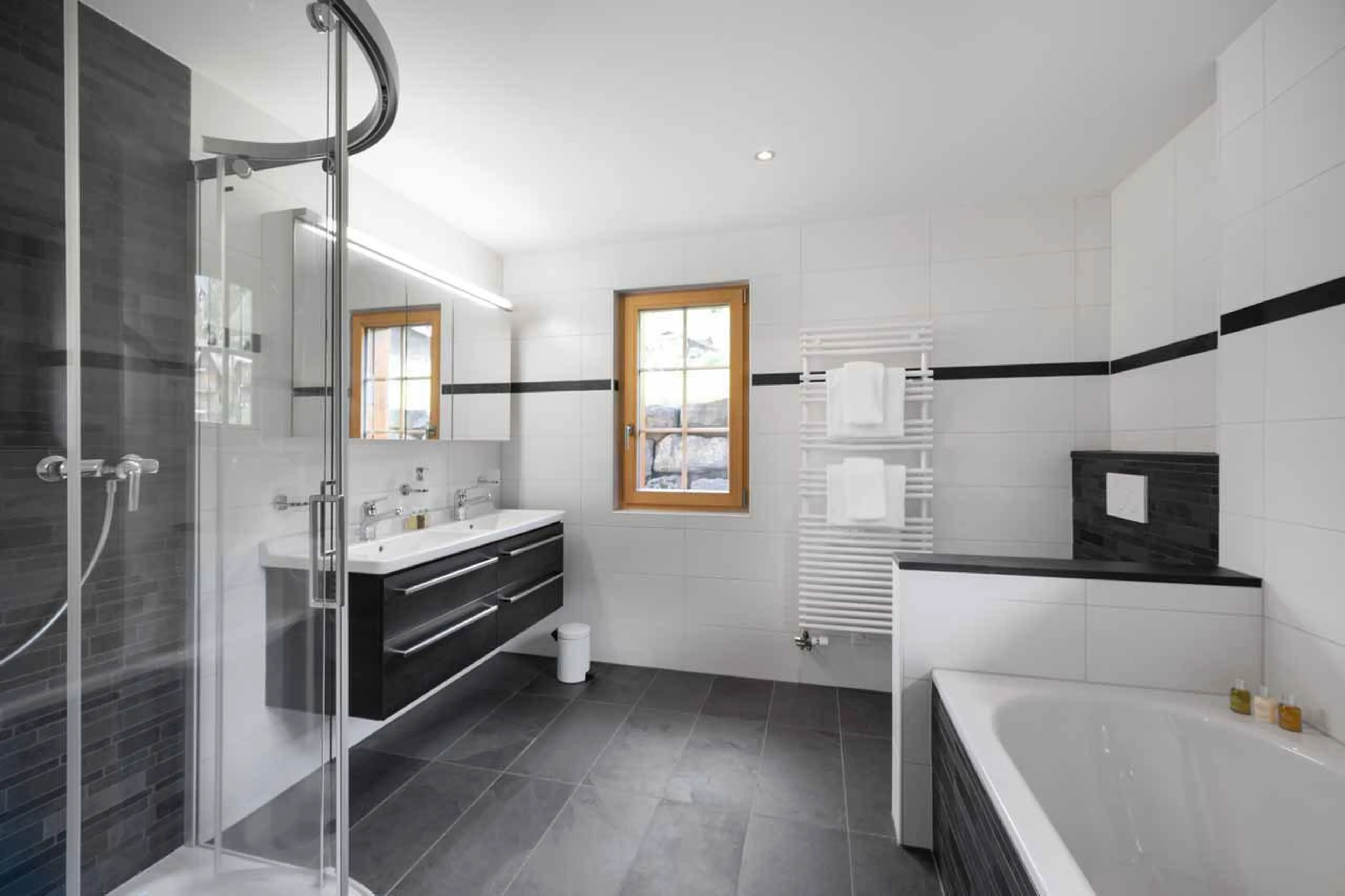 En-suite bathroom with his and hers sinks at Chalet Alia in Grindelwald