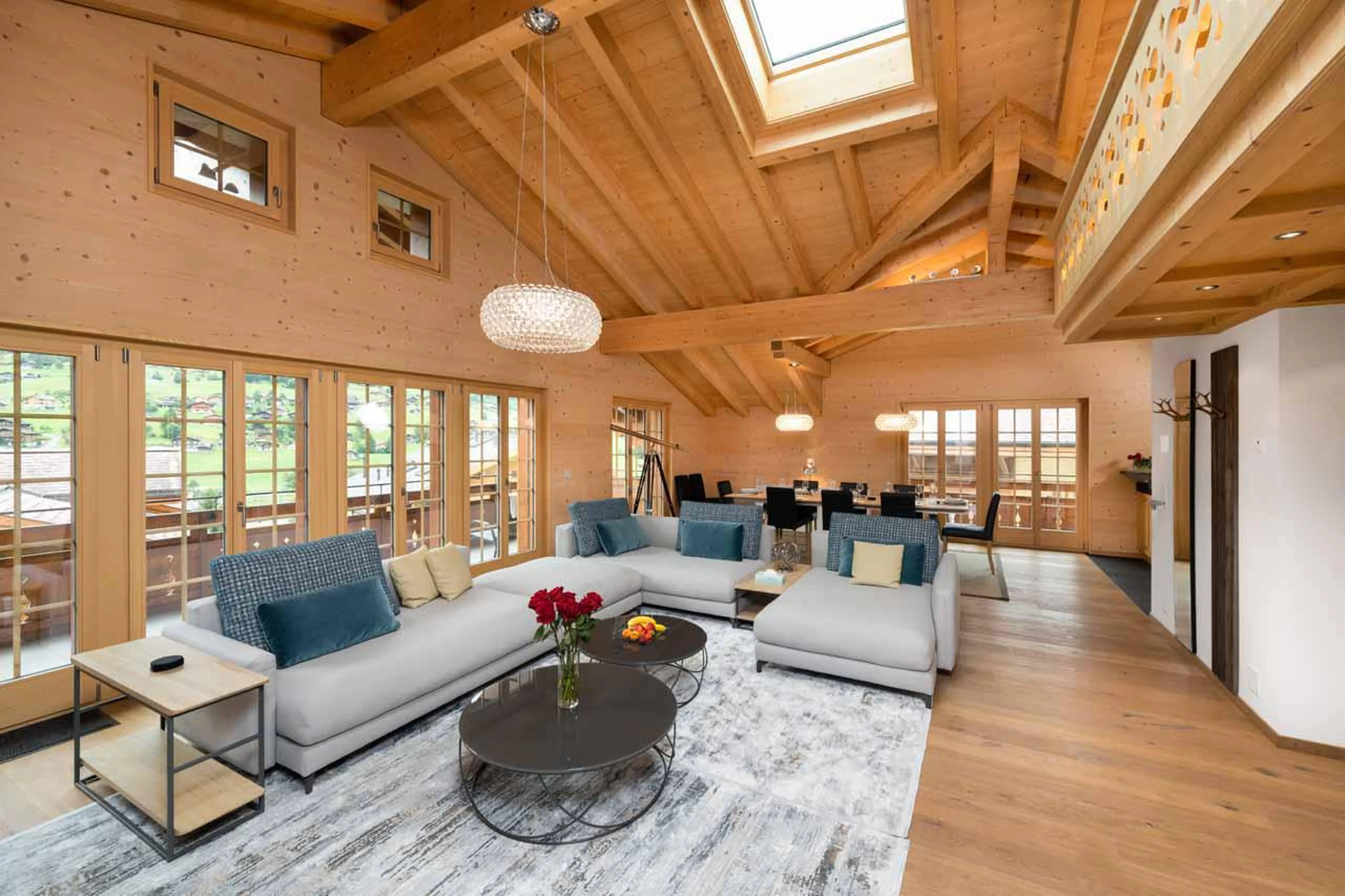 Open-plan living space at Chalet Alia in Grindelwald