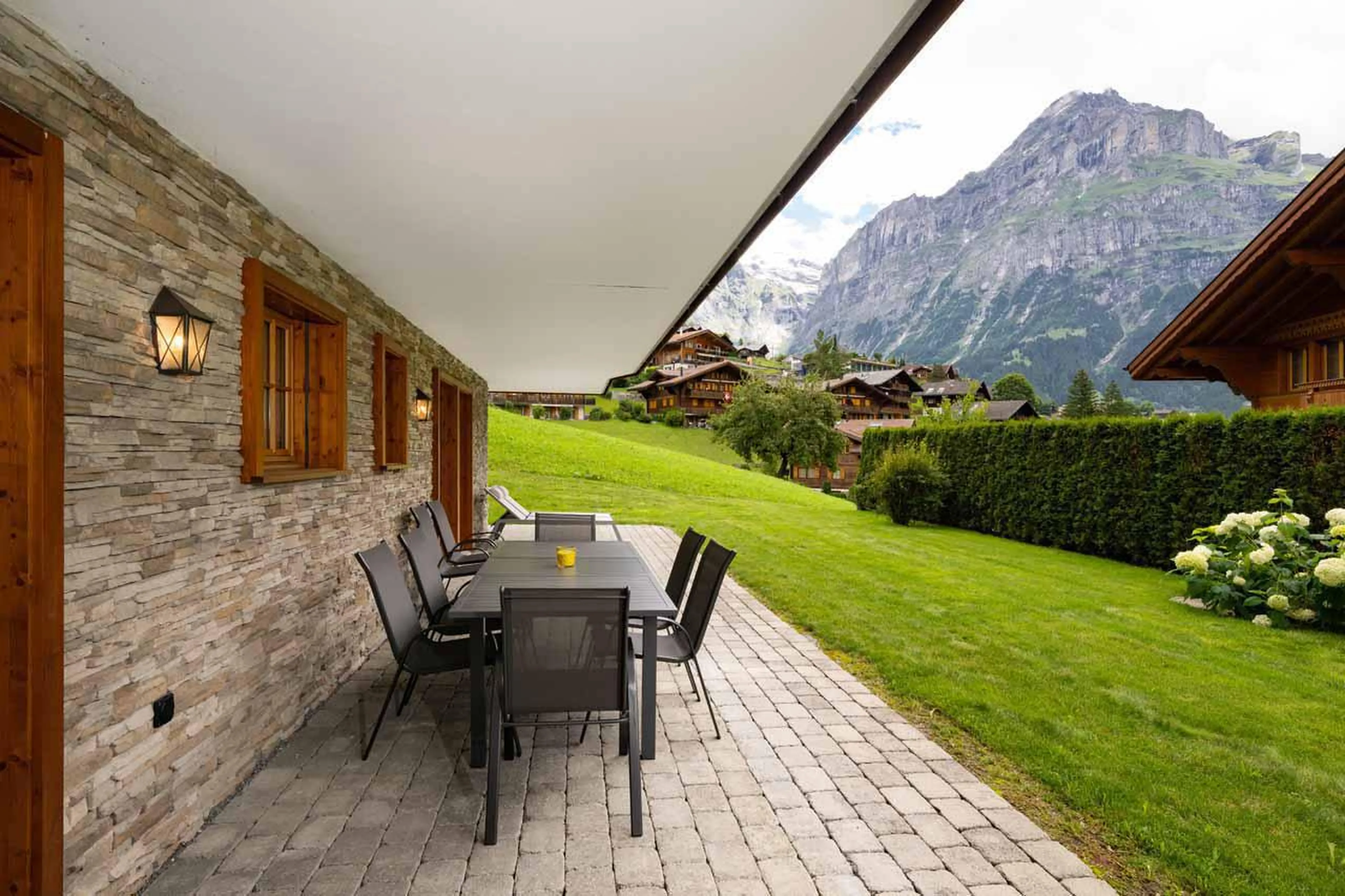 Ground floor terrace with mountain views at Chalet Alia in Grindelwald