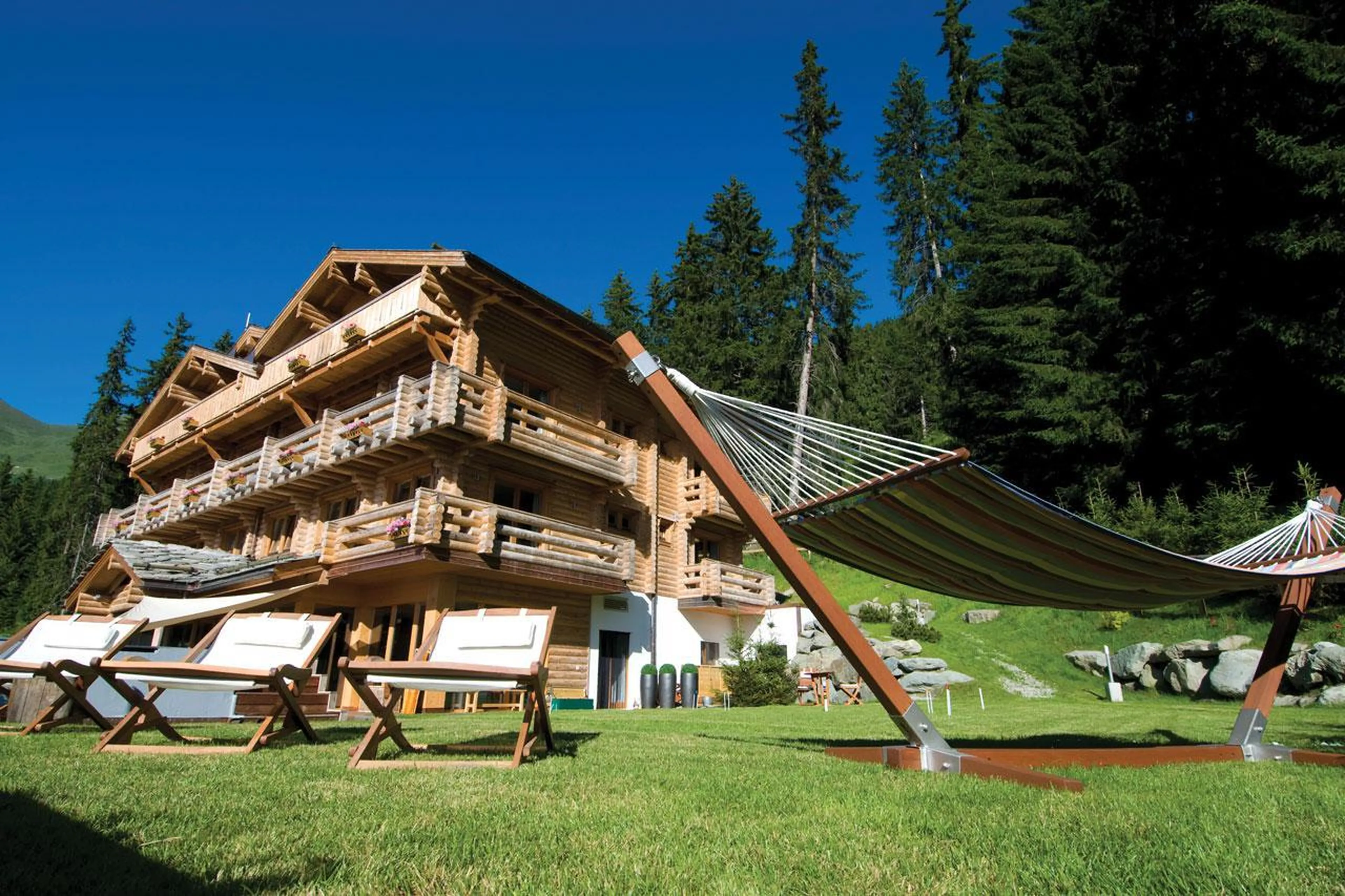 Exterior of The Lodge in Verbier in summer