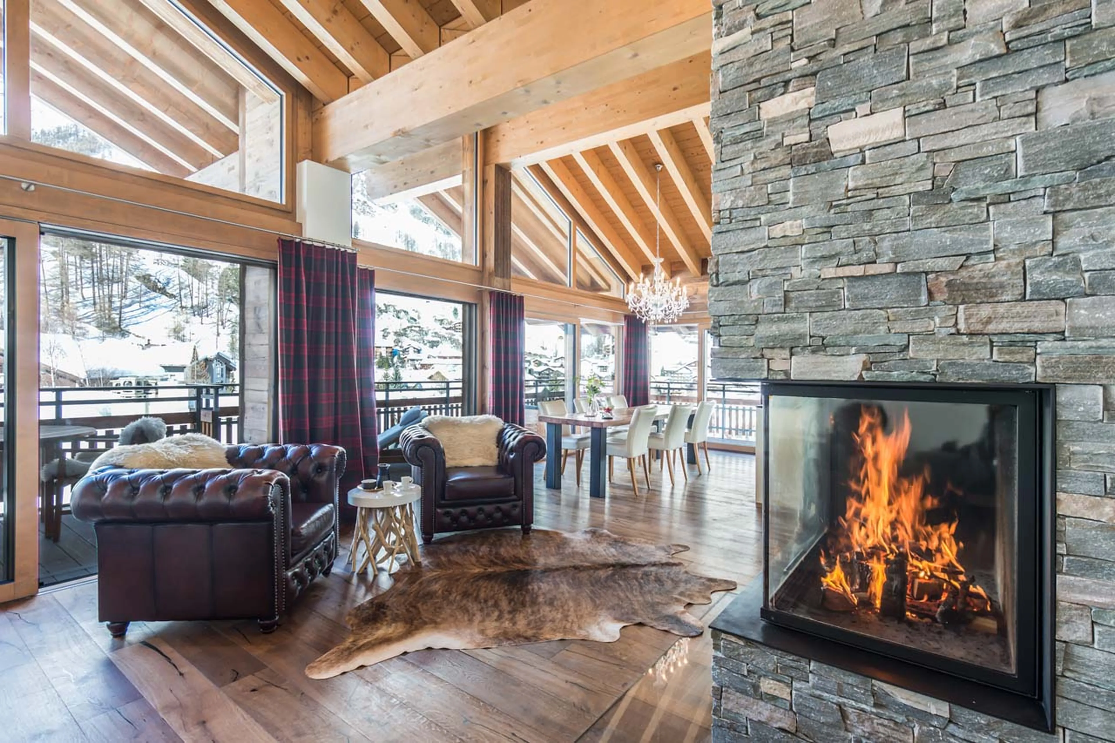 Armchairs by the fire in Penthouse Aria in Zermatt