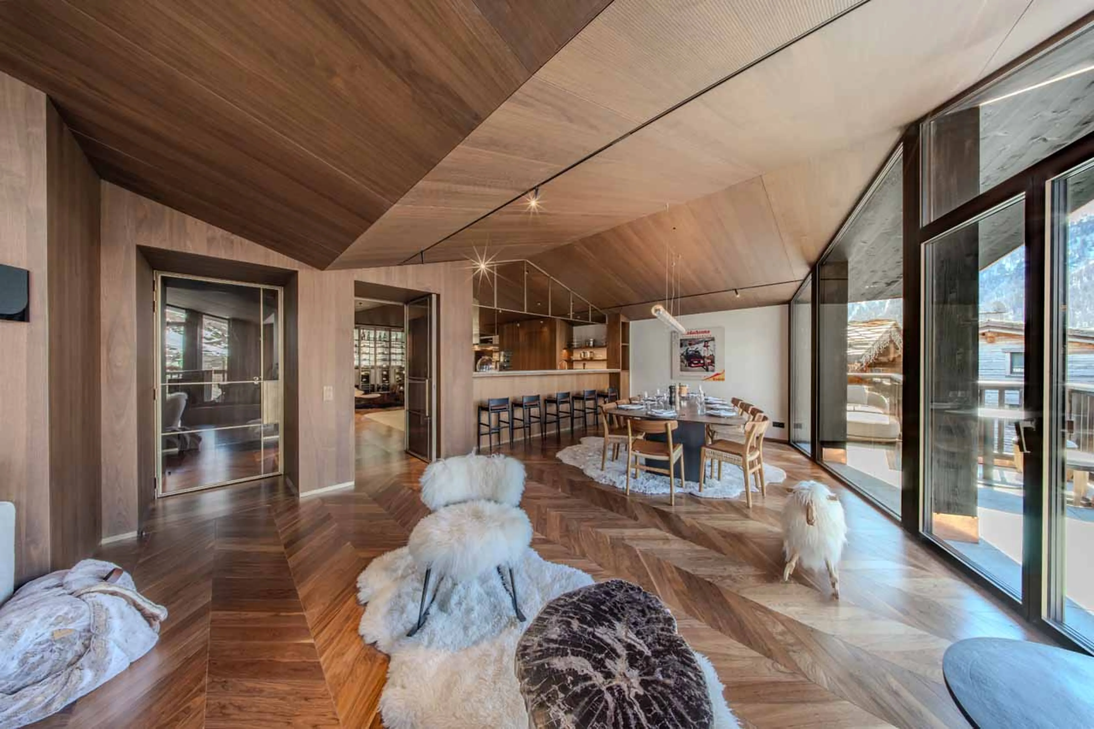 Dining table and kitchen bar at Penthouse Cristal in Val d'Isere