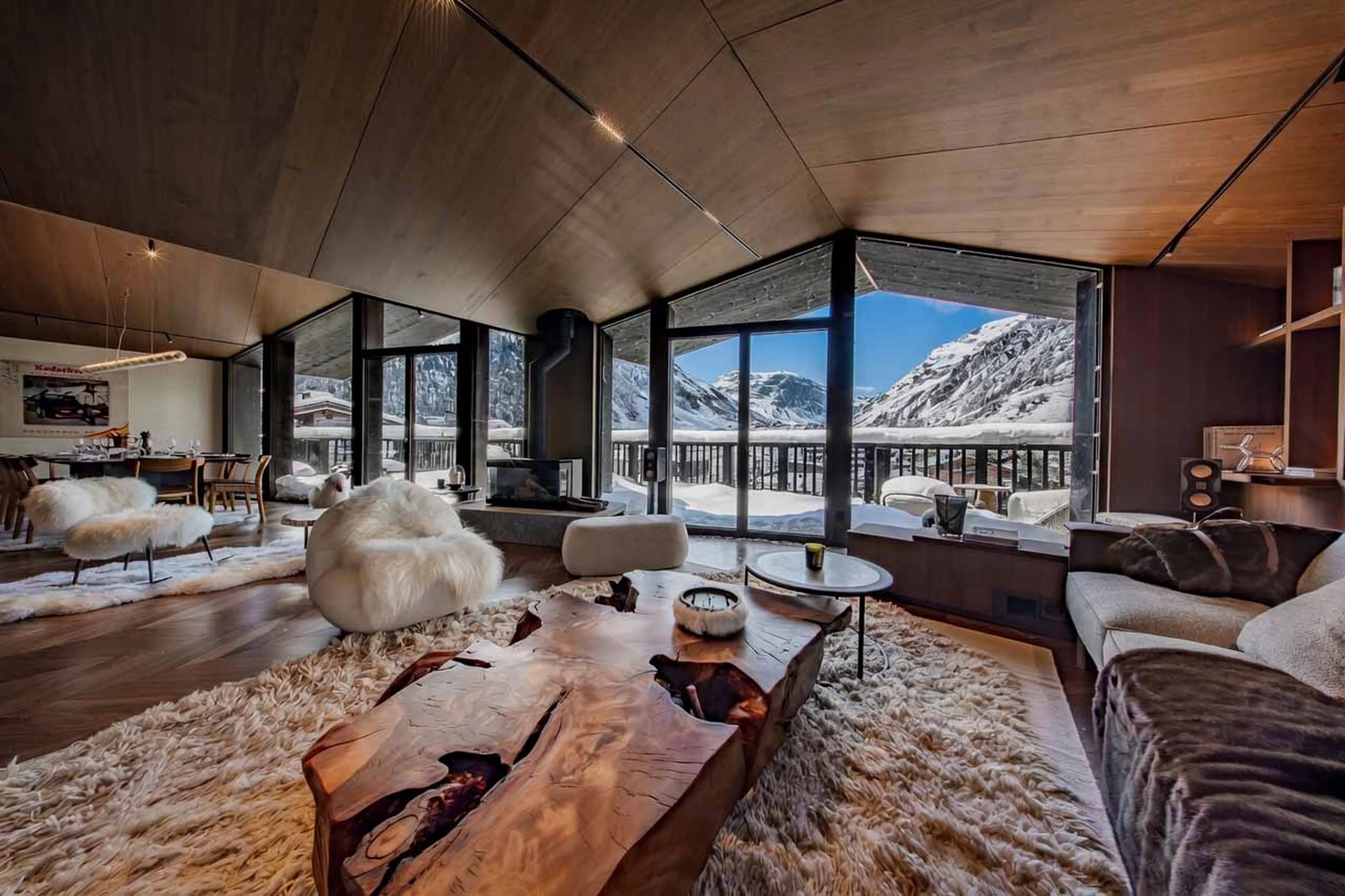 Spacious living and dining area at Penthouse Cristal in Val d'Isere