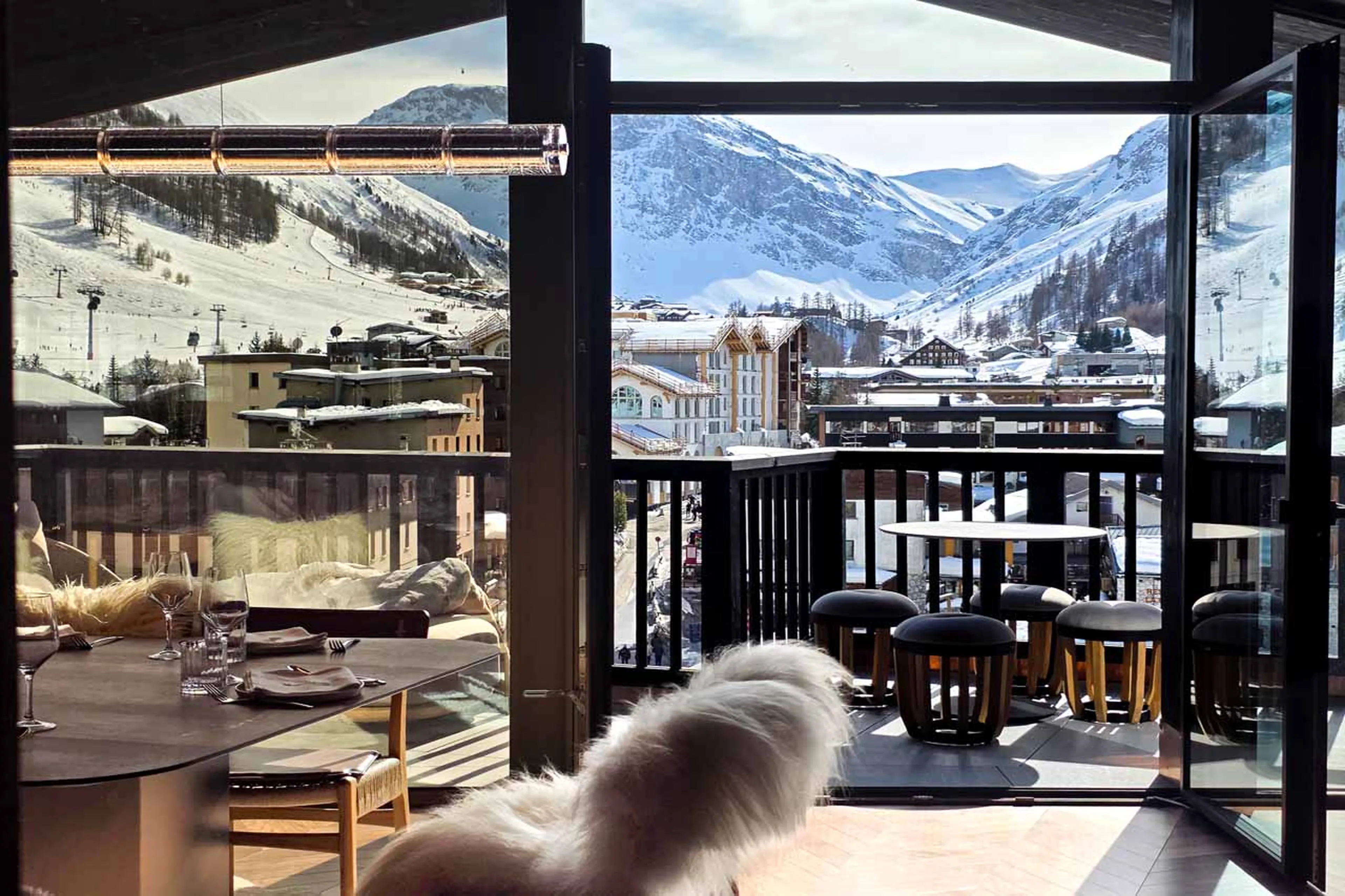 Living area leading onto balcony at Penthouse Cristal in Val d'Isere