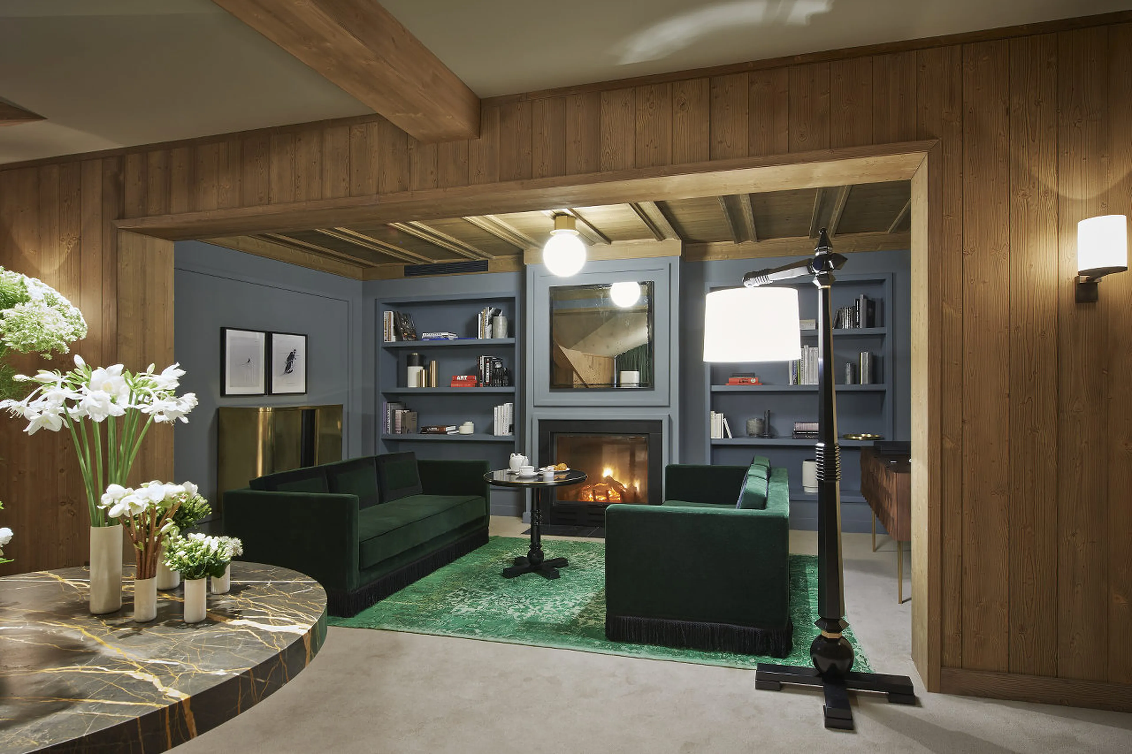 Smart living room with fireplace in Penthouse de L’ Apogée in Courchevel 1850